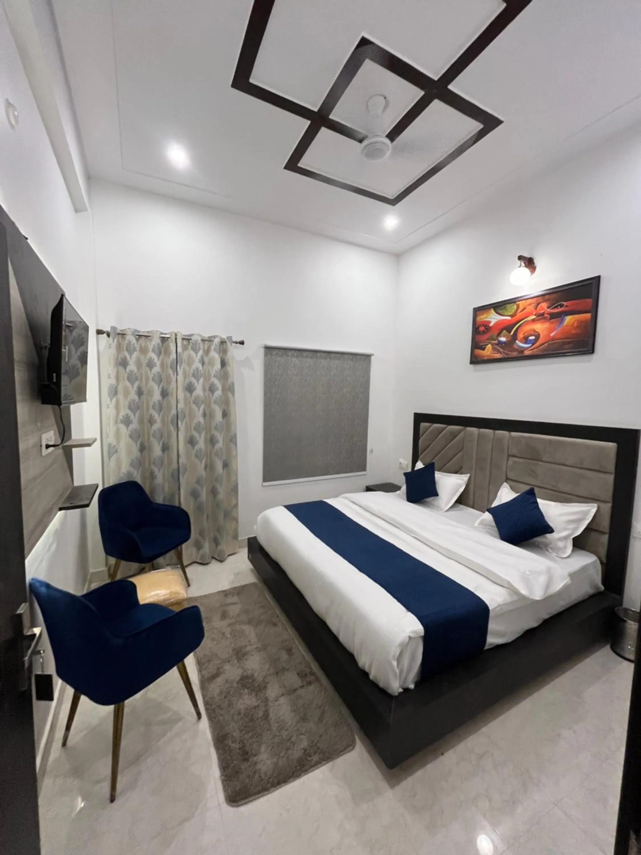 Bed in The nines hotel & restro