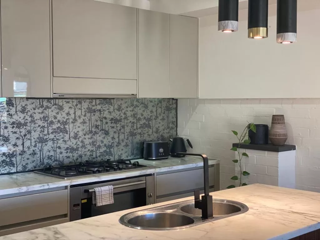 Kitchen or kitchenette in Byron Butter Factory Apartments