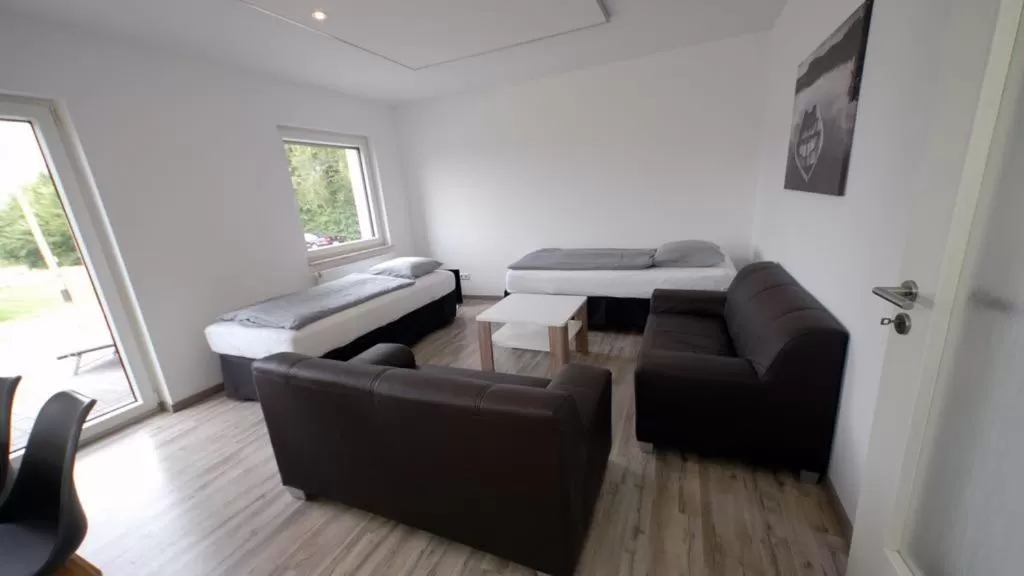 Bed, Seating Area in Kraftwerk Relax Motel