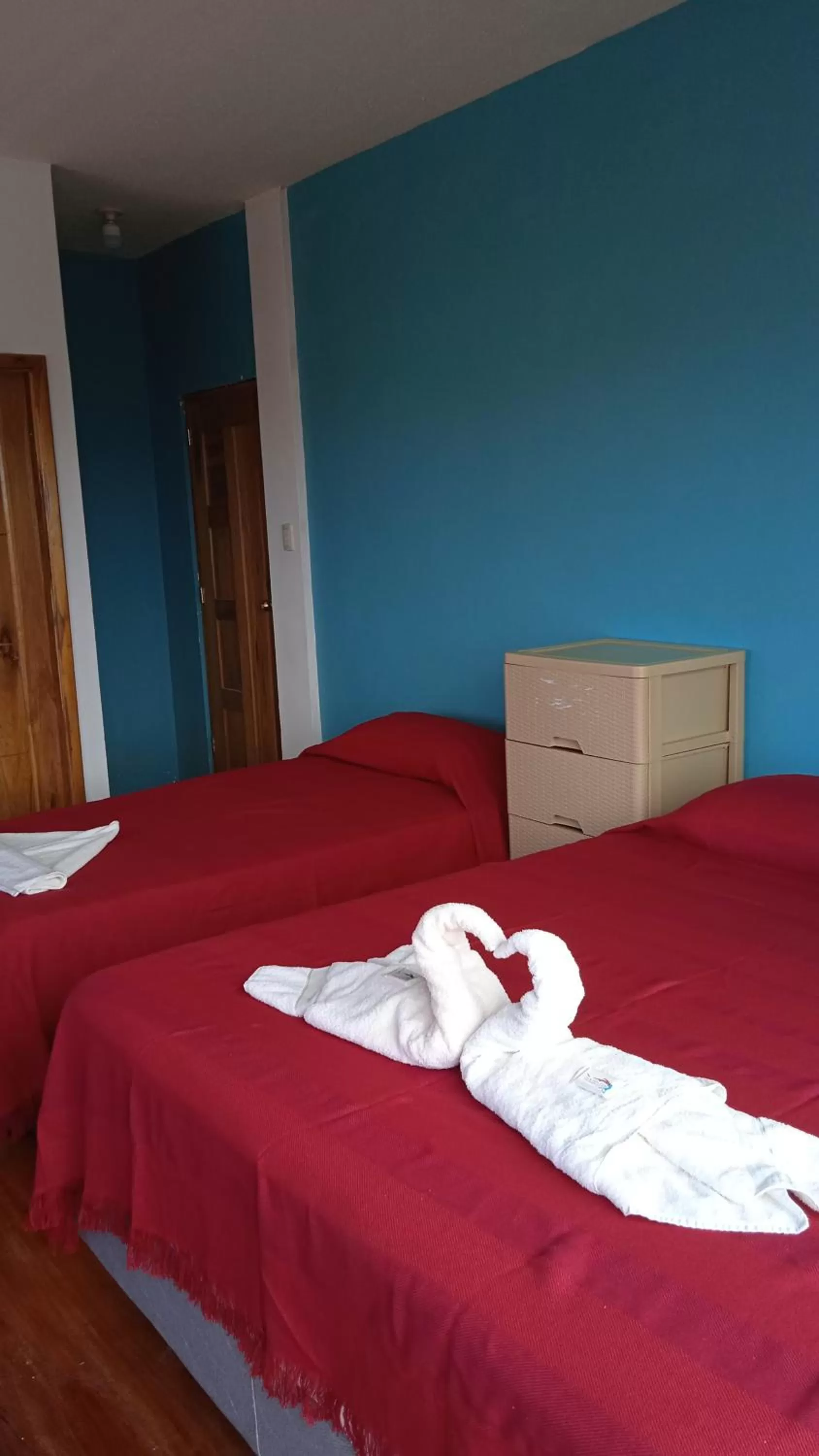 Bed in Hostal Cabañas Don Jorge