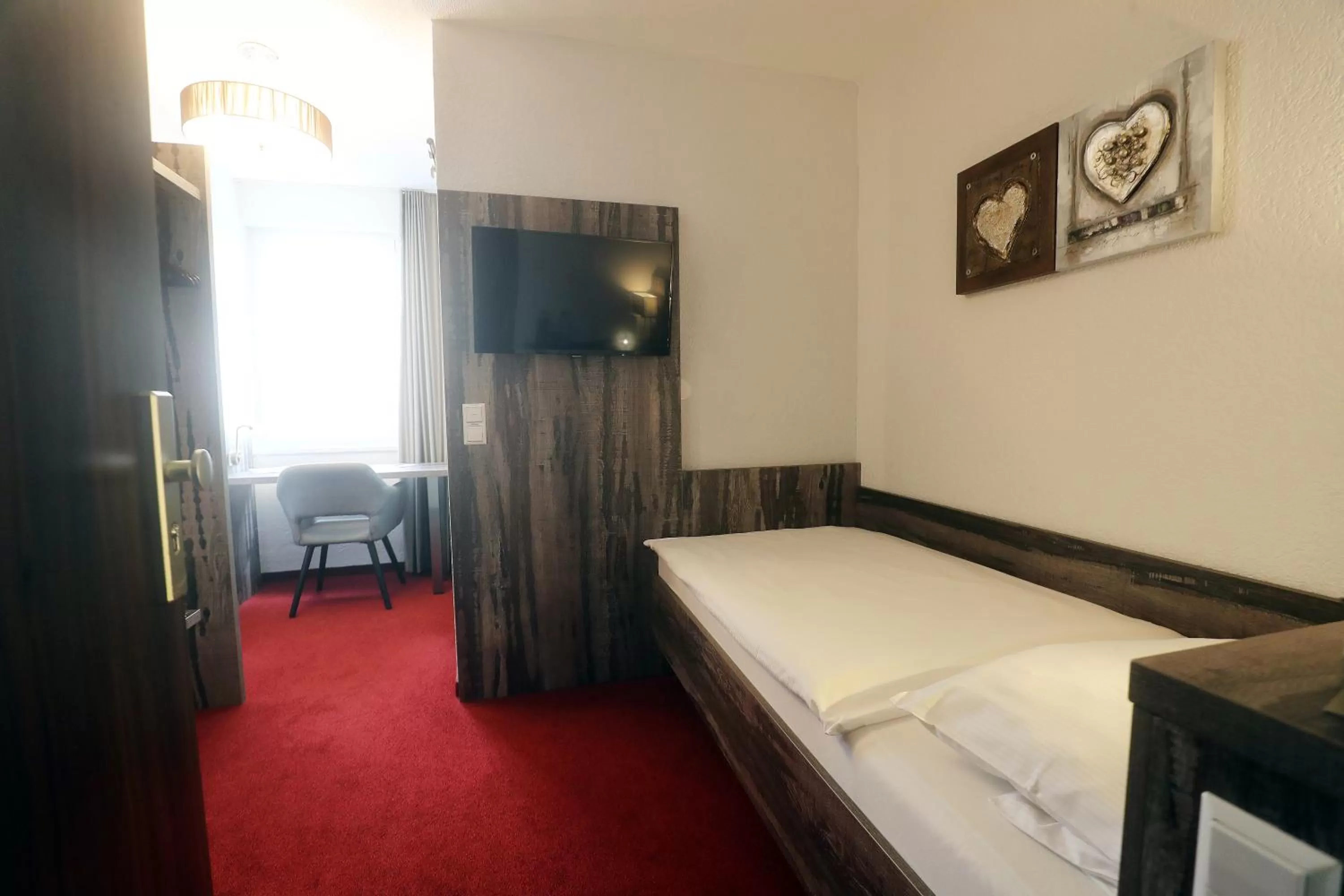 Bed in stadthotel miya