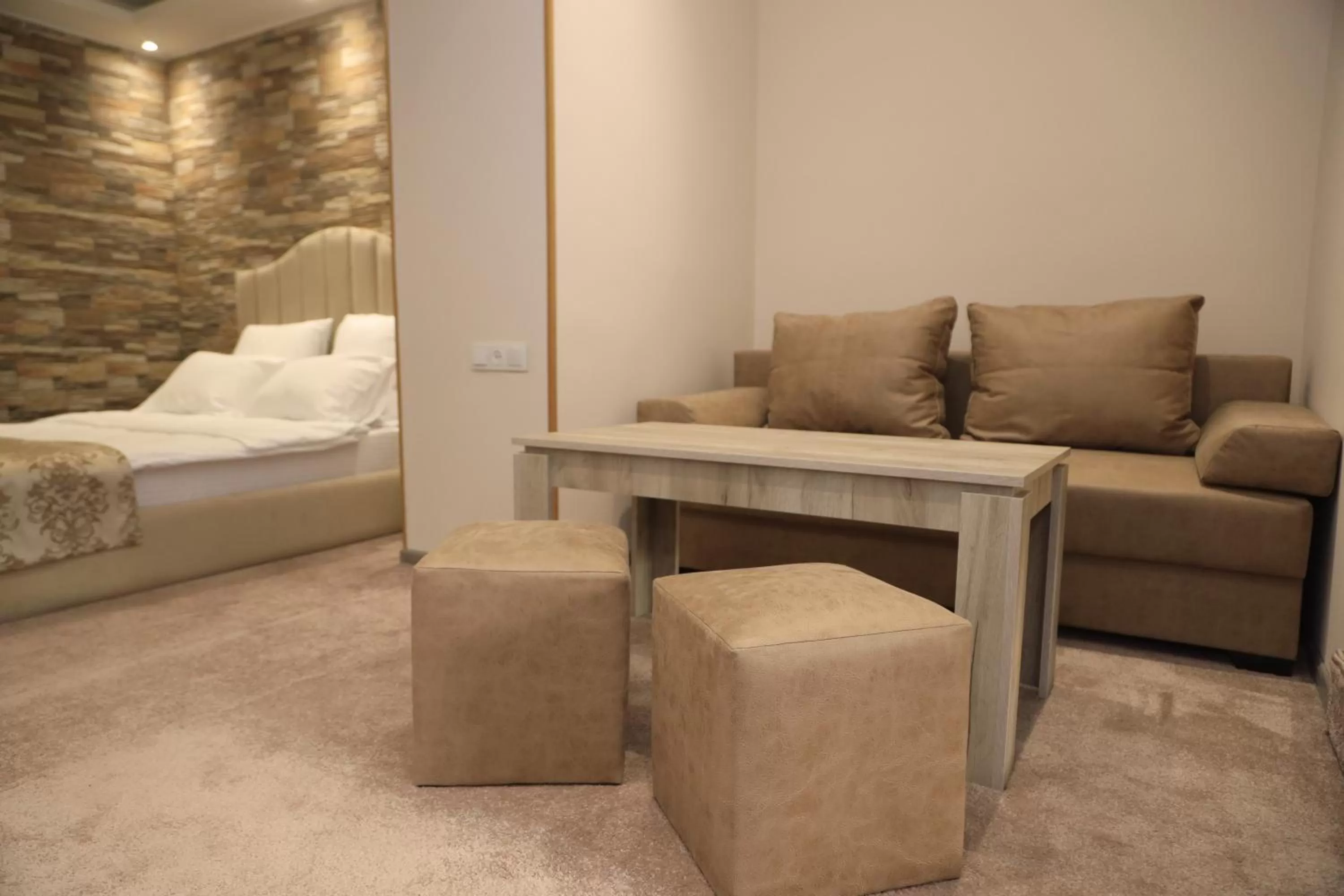 Photo of the whole room, Seating Area in DeLin Hotel And Tours