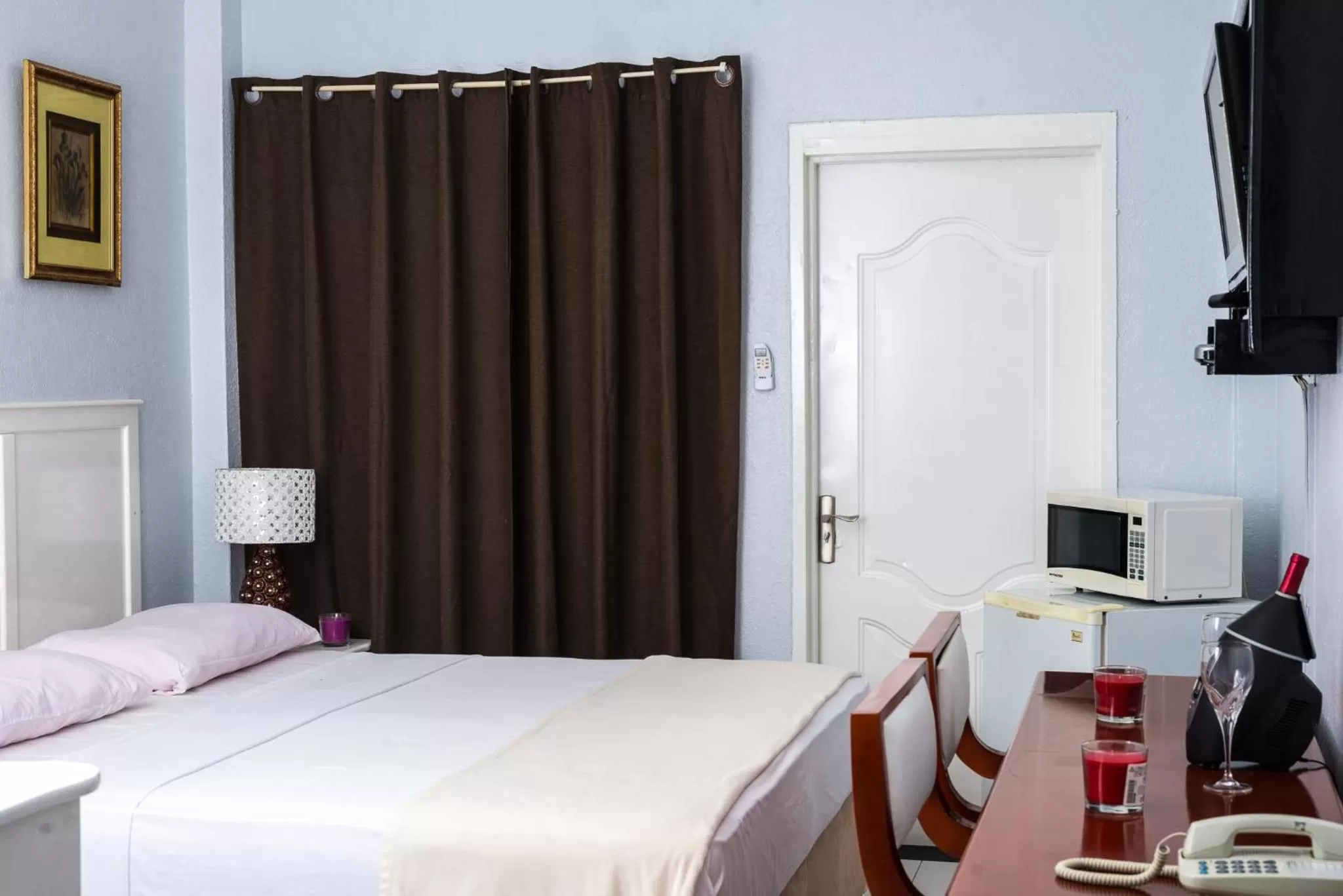 Bed in Status International Hotel