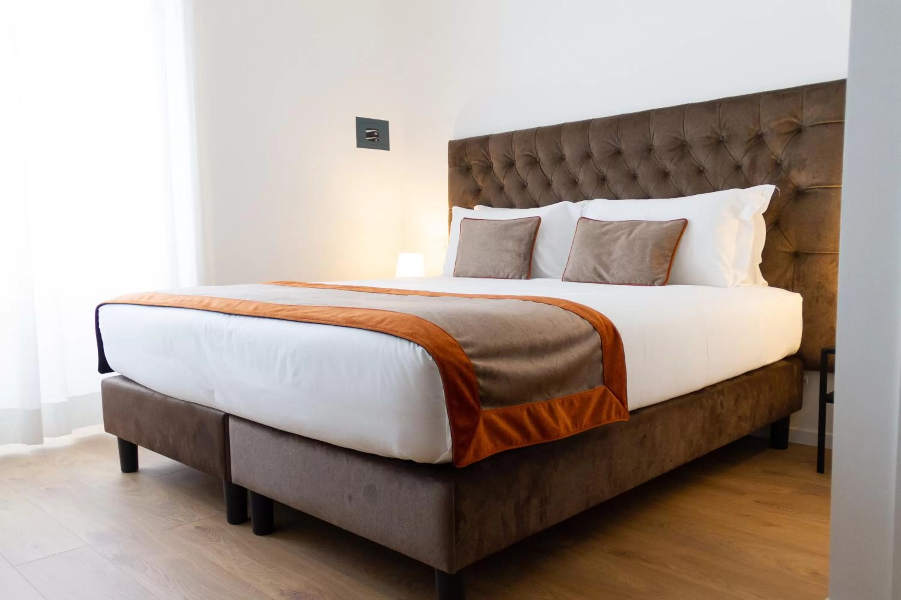 Bed in Michelangelo Vatican Rooms