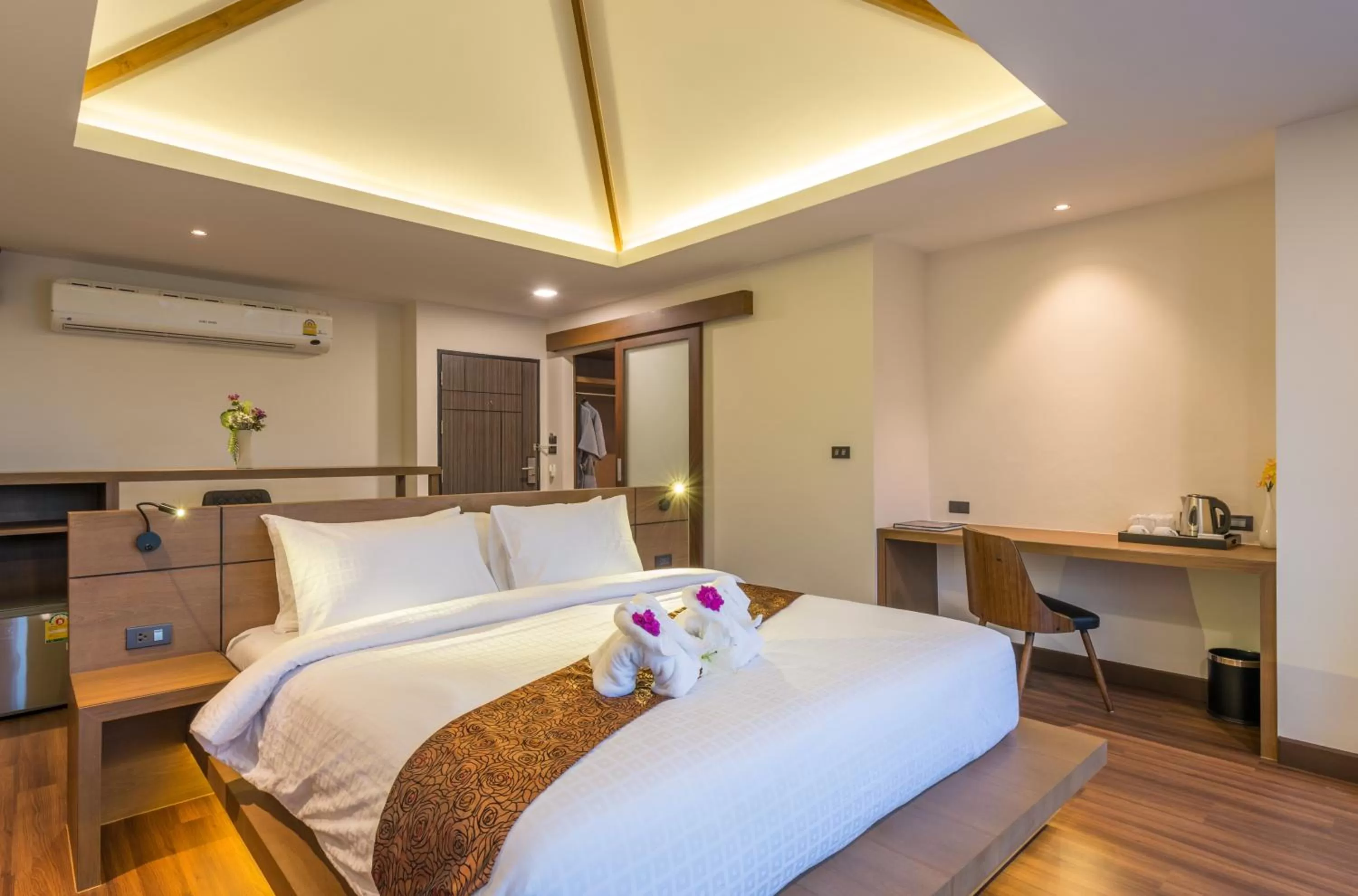 Bed in Cher​mantra​ Aonang​ Resort & Pool​ Suite