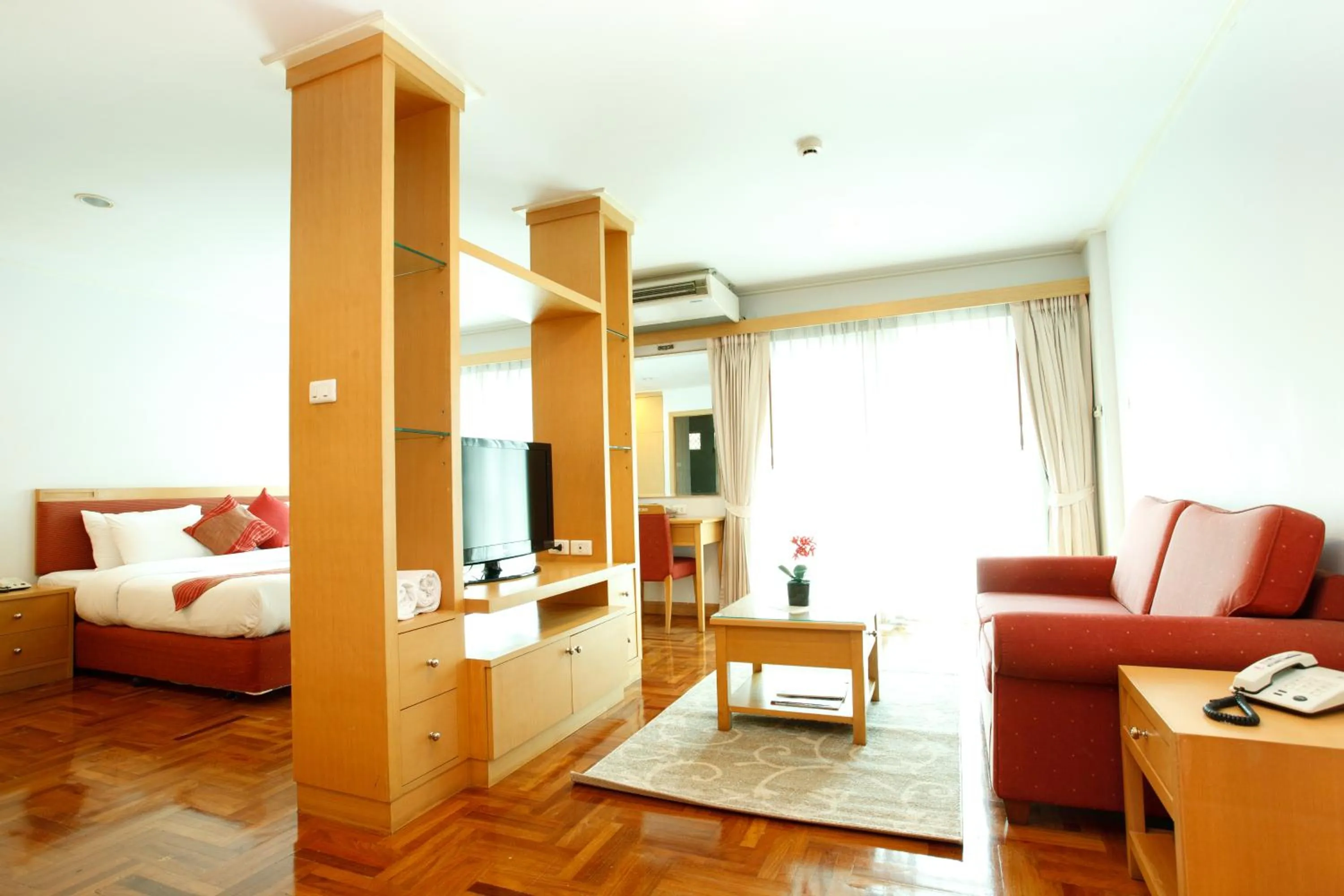 Bed in Chaidee Mansion