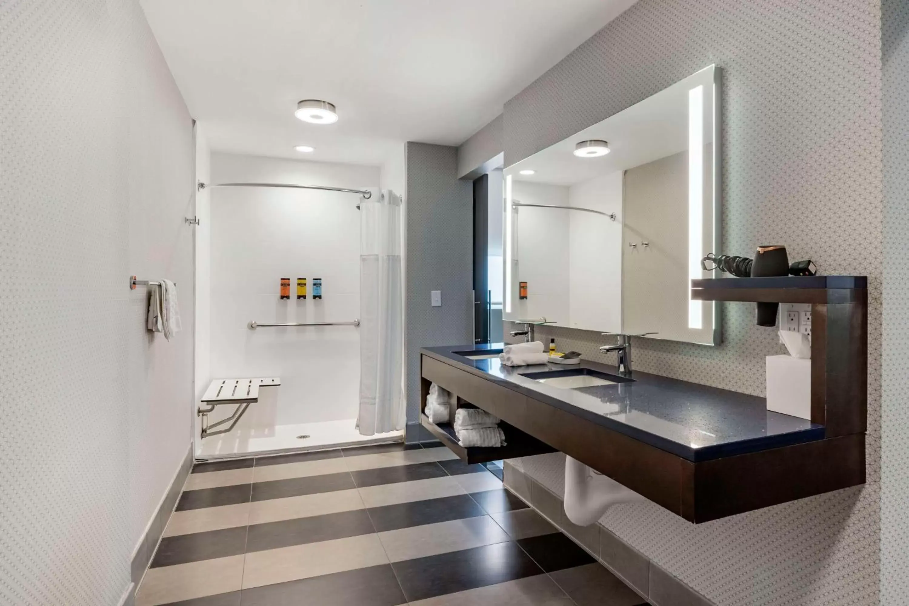 King Room with Mobility Accessible Roll-In Shower in GLō Best Western Savannah-Gateway I-95 King Room with Mobility Accessible Roll-In Shower in GLō Best Western Savannah-Gateway I-95