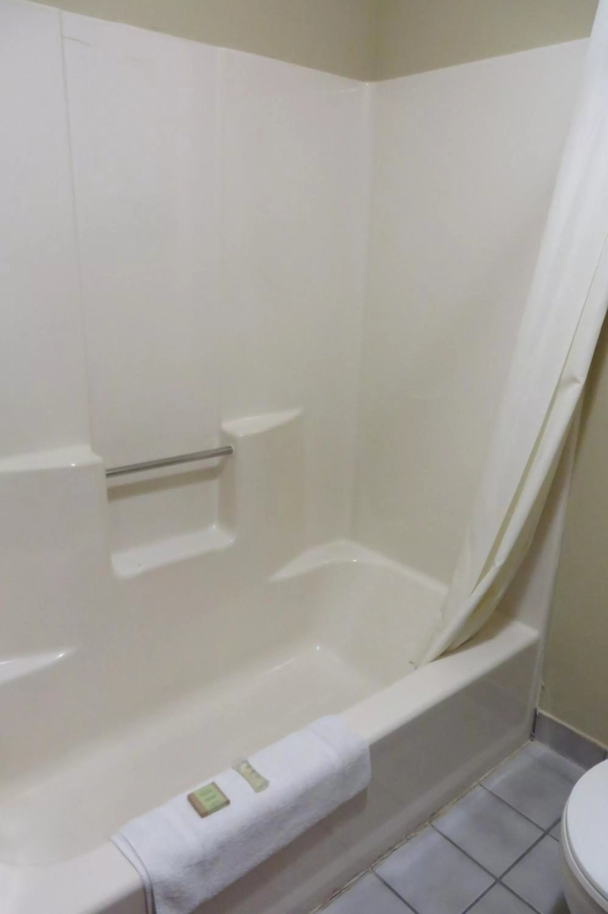 Bathroom in Super 8 by Wyndham Grinnell IA