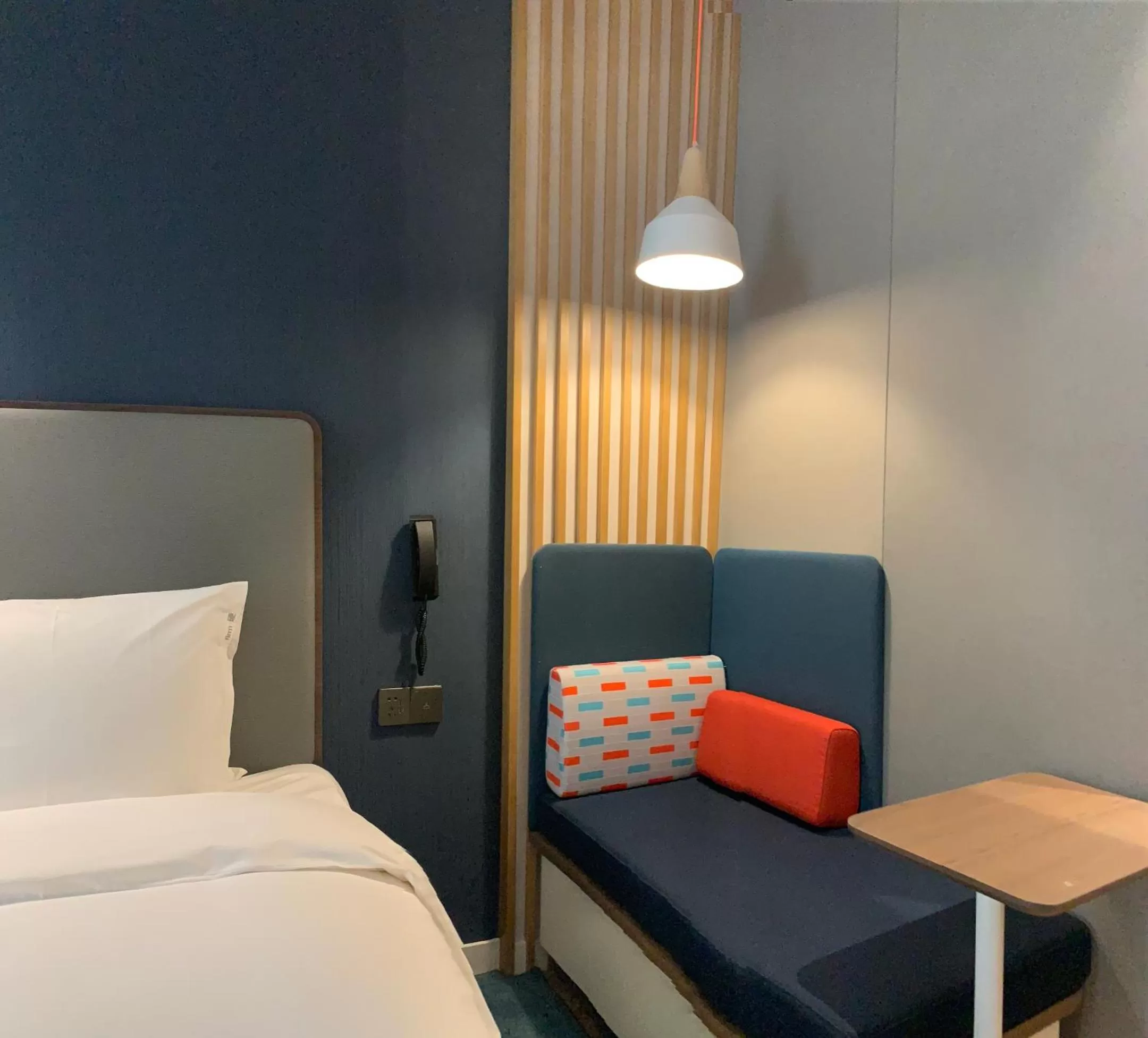 Bed in Holiday Inn Express Shanghai Kangqiao by IHG