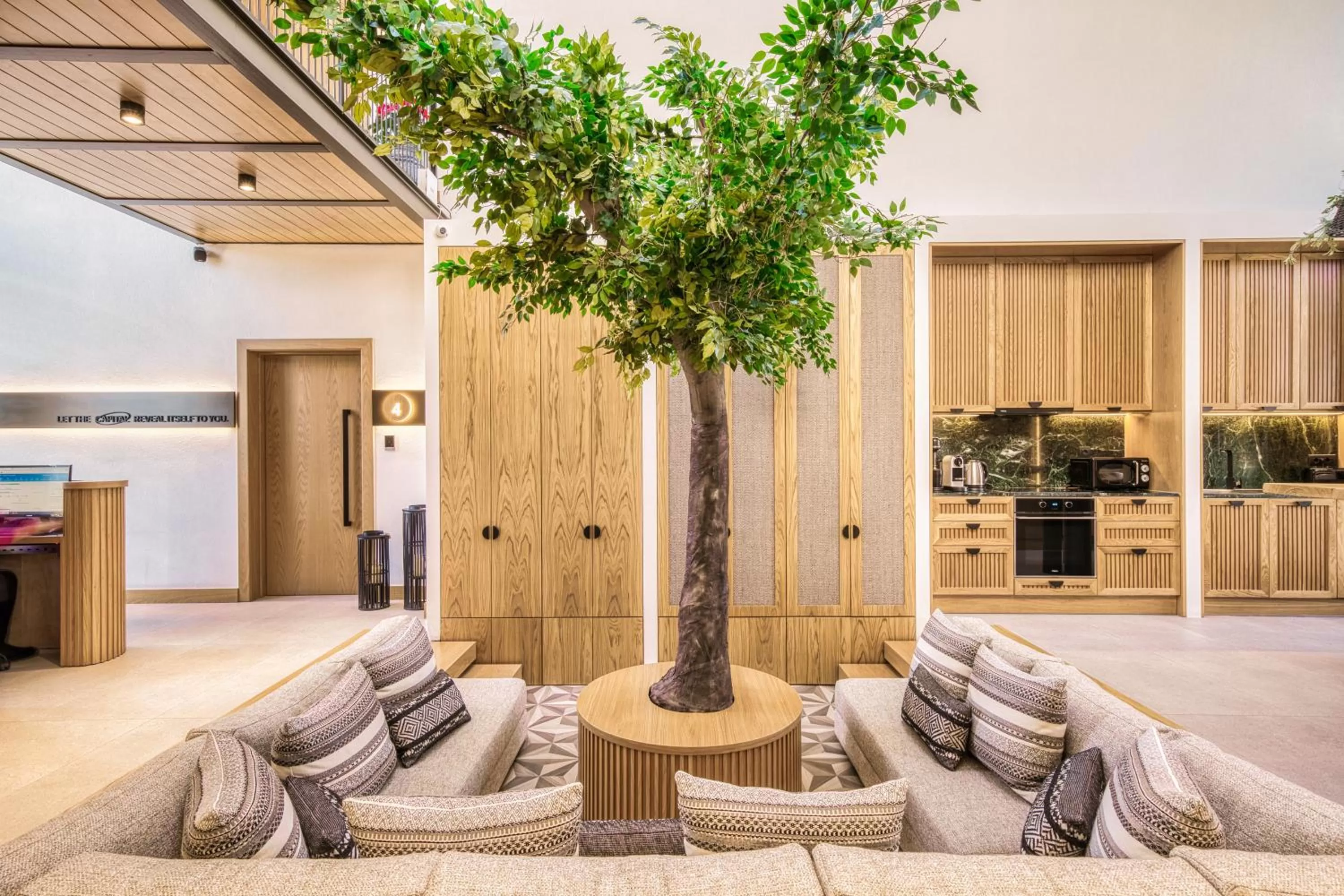 Communal lounge/ TV room in Capital Luxury Suites