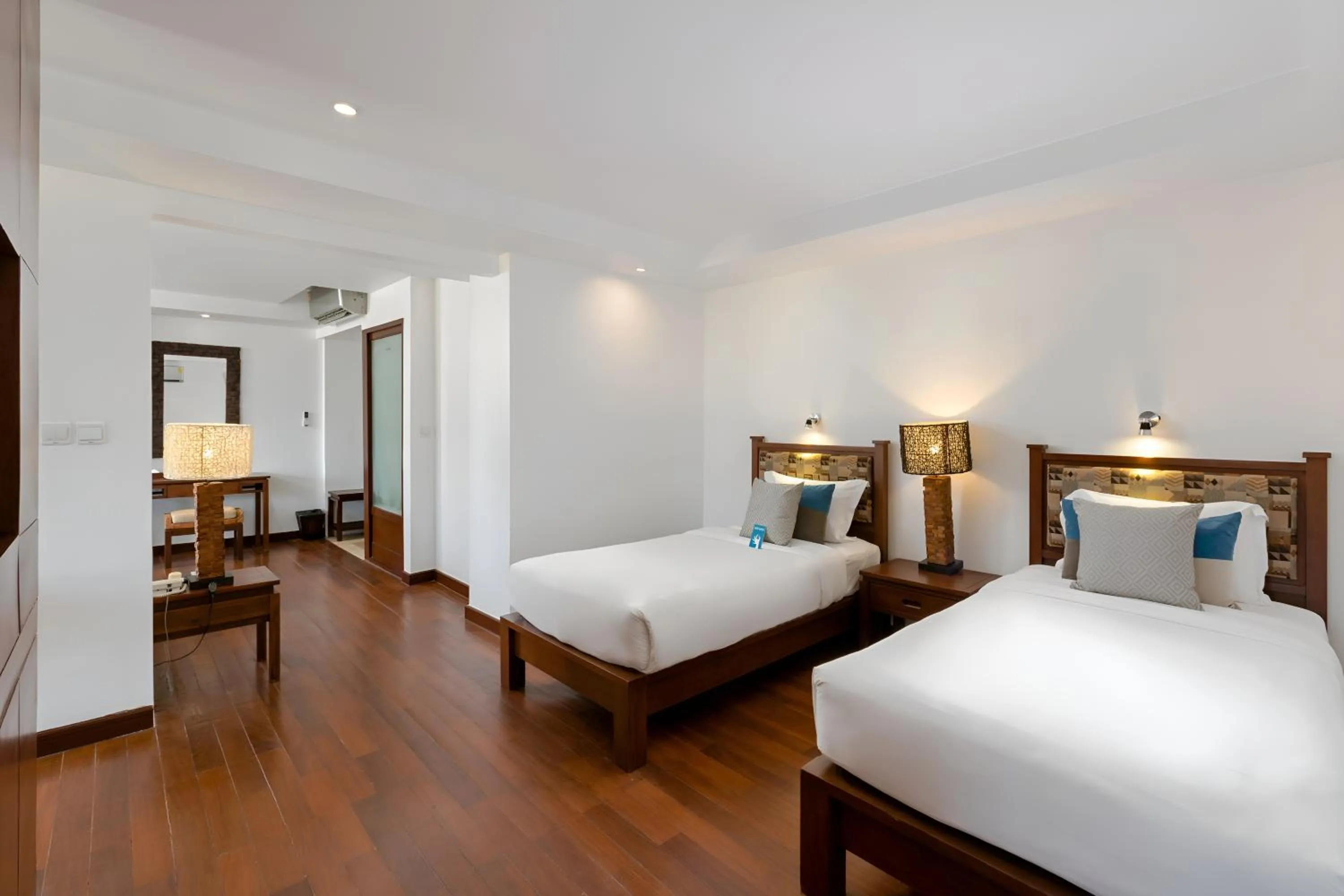 Bed in Baan Laimai Beach Resort & Spa - SHA Extra Plus