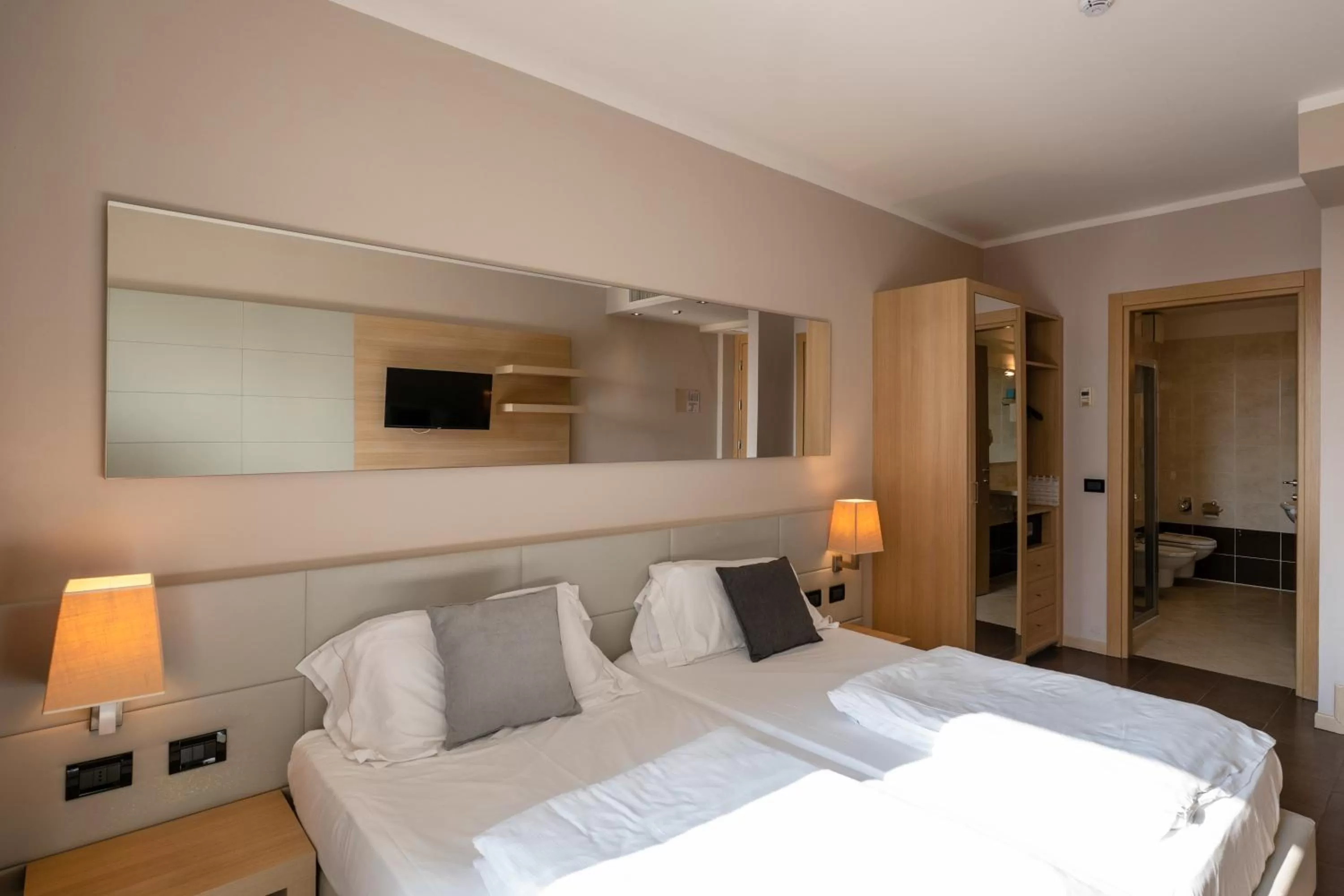 Bed in Villa Luisa Resort & Luxury Apartments