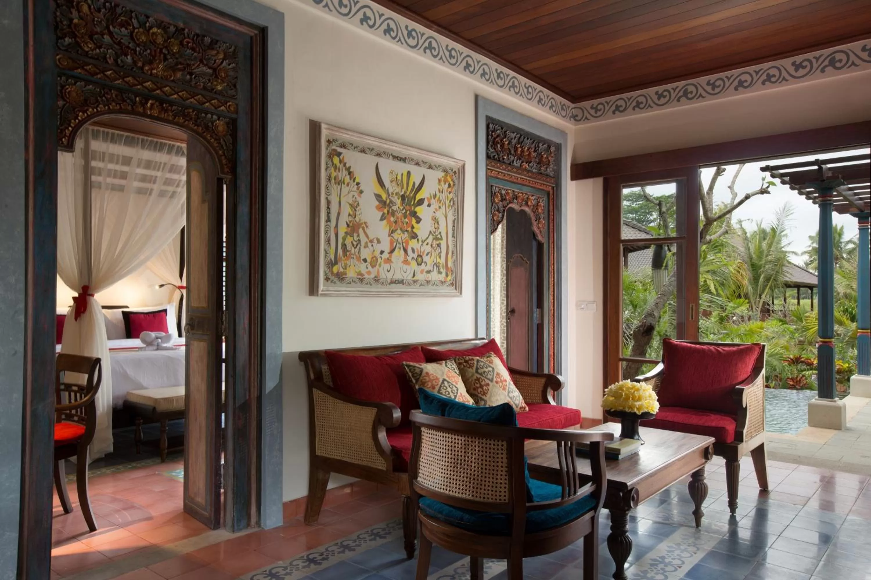 Living room, Bed in Dwaraka The Royal Villas
