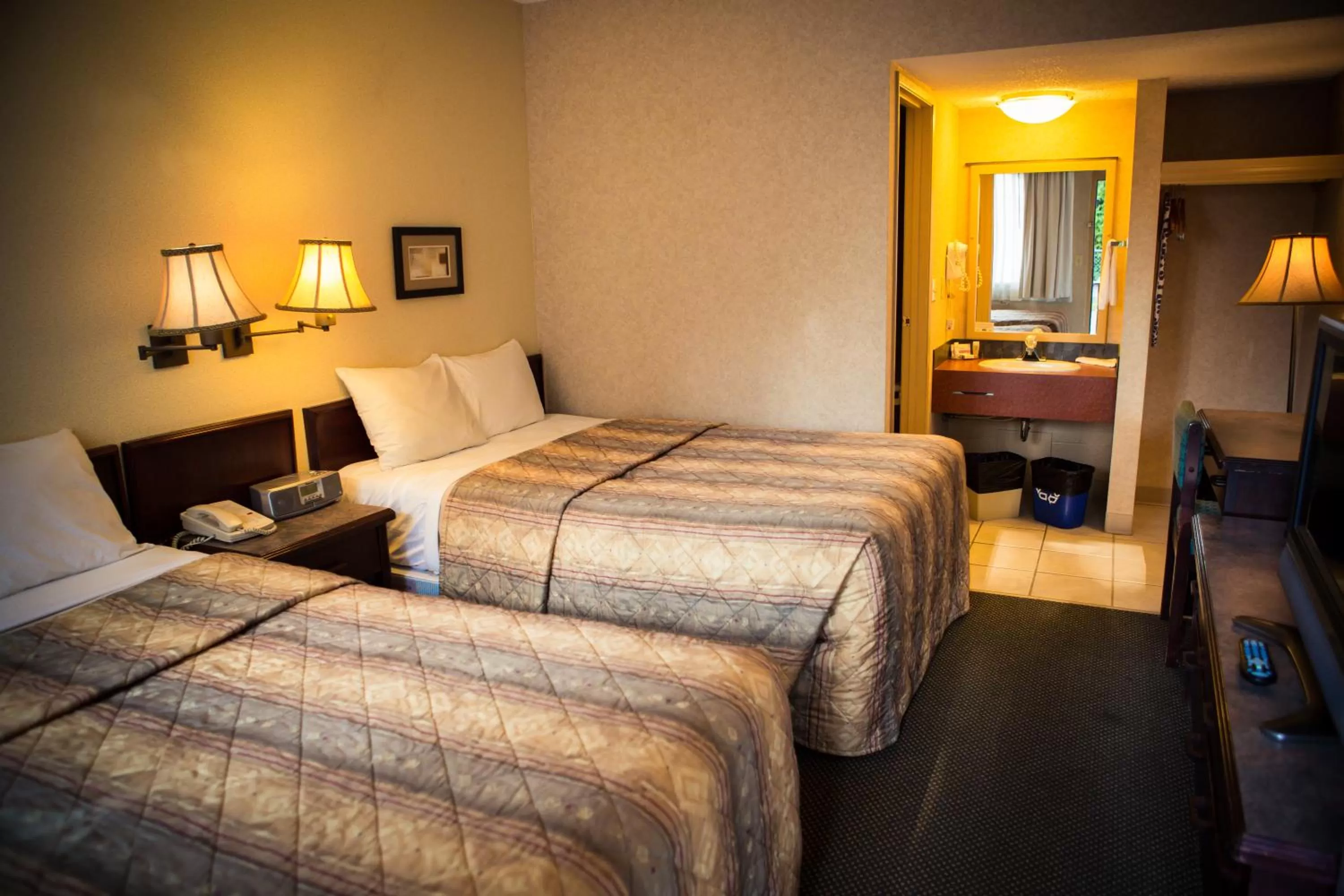 Photo of the whole room, Bed in Langley Hwy Hotel
