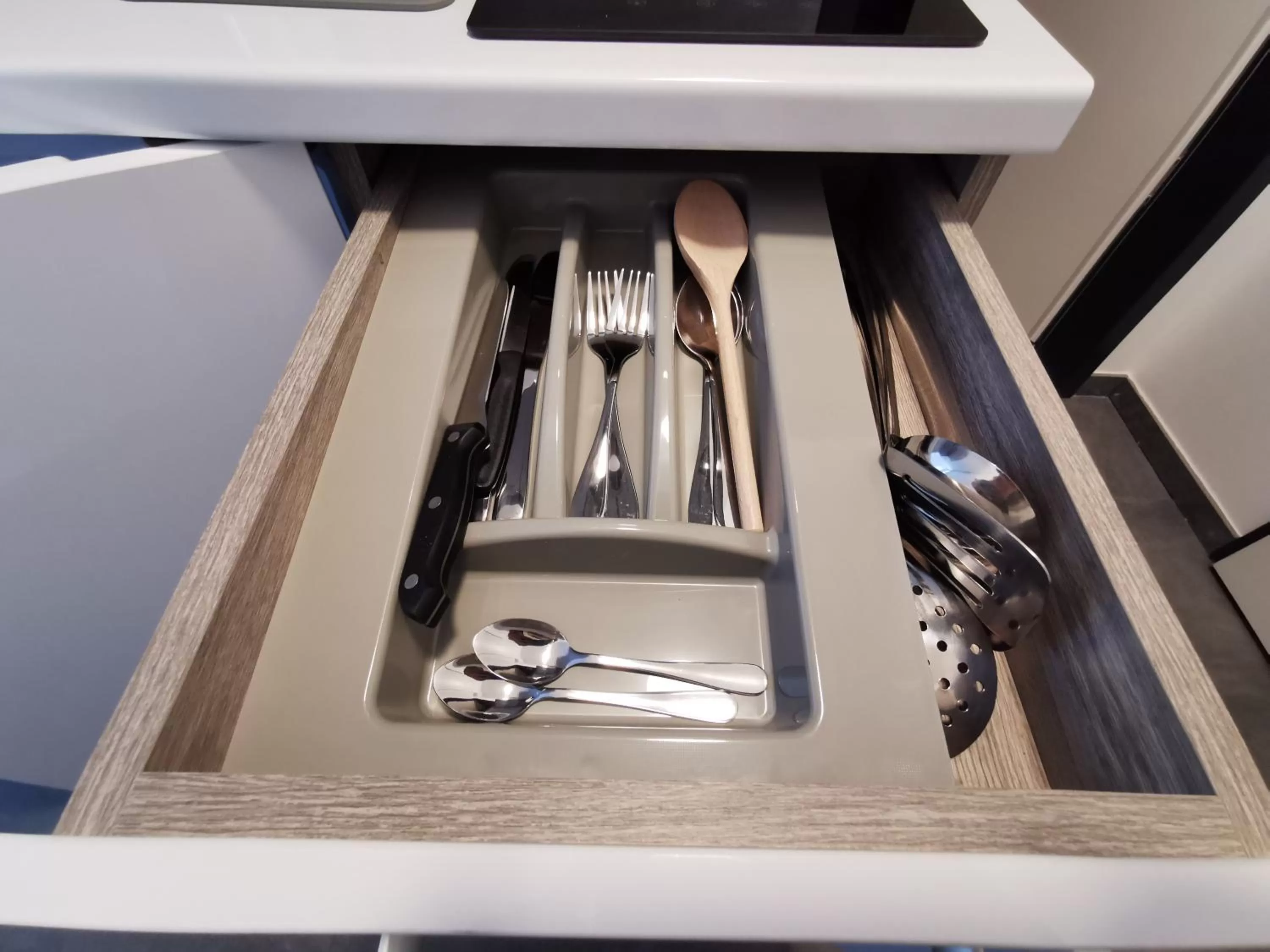 Kitchen or kitchenette in HP Apartments