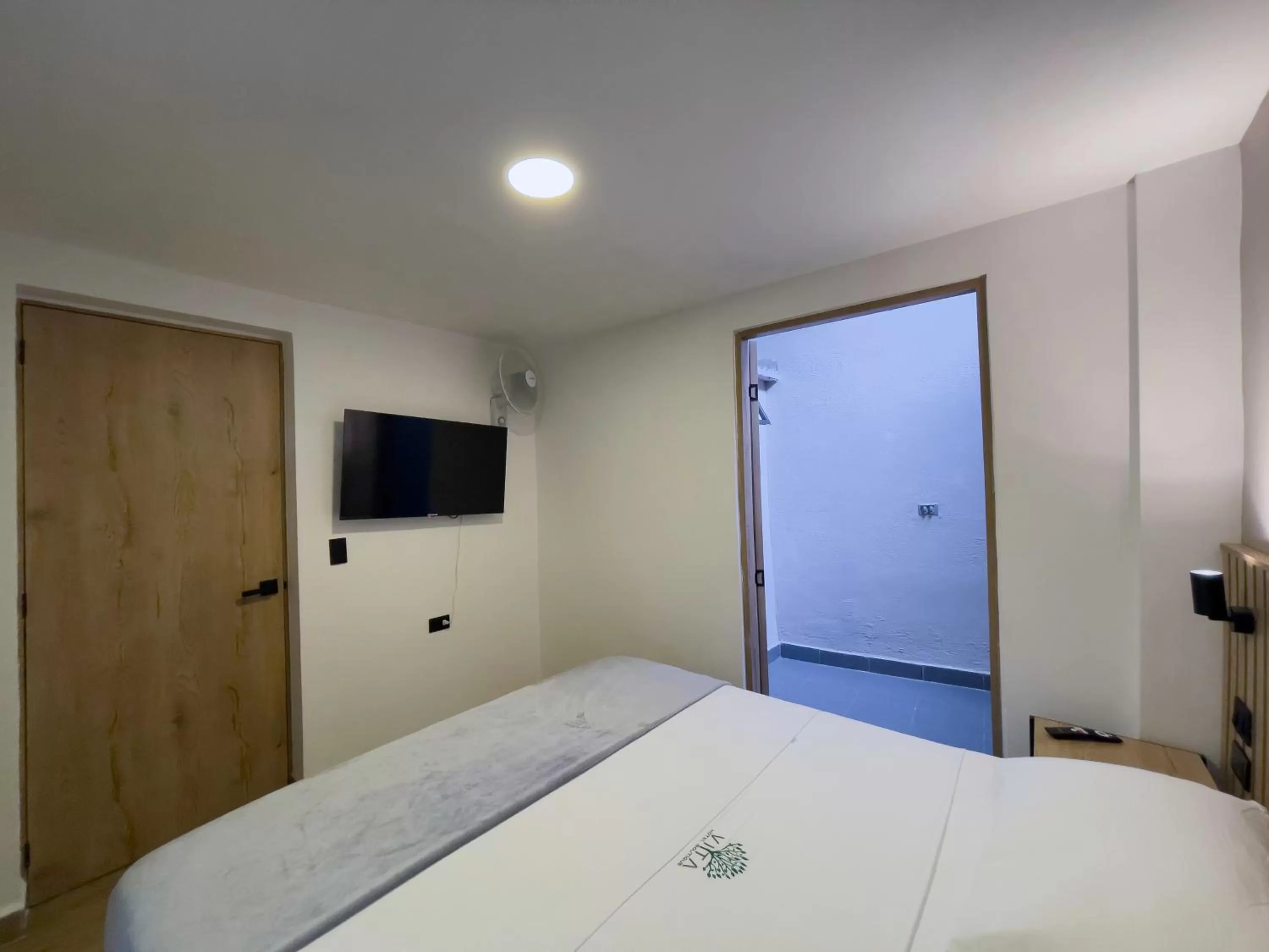 Bed in Vita Hotel Boutique