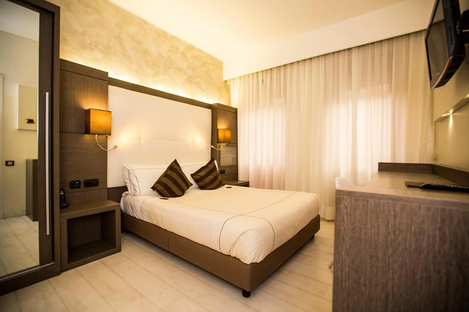 Photo of the whole room, Bed in Agape Hotel - AA Hotels