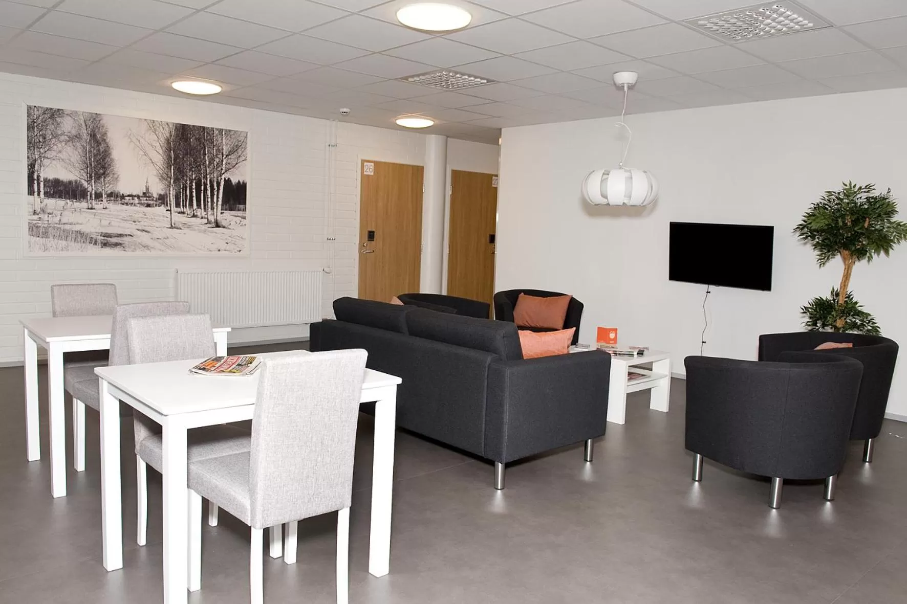 Communal lounge/ TV room in Forenom Aparthotel Raahe