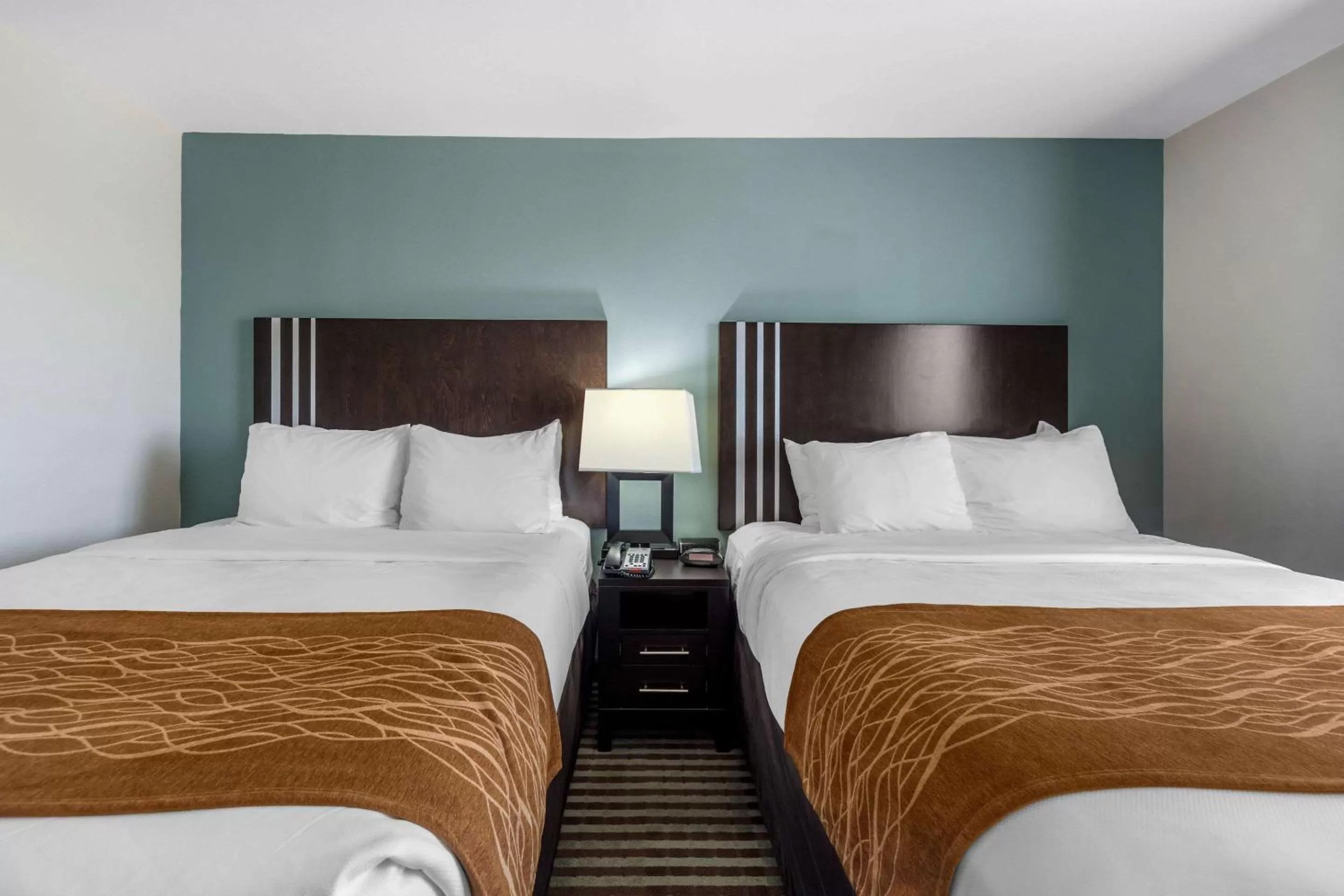 Photo of the whole room, Bed in Comfort Inn & Suites Perry I-35