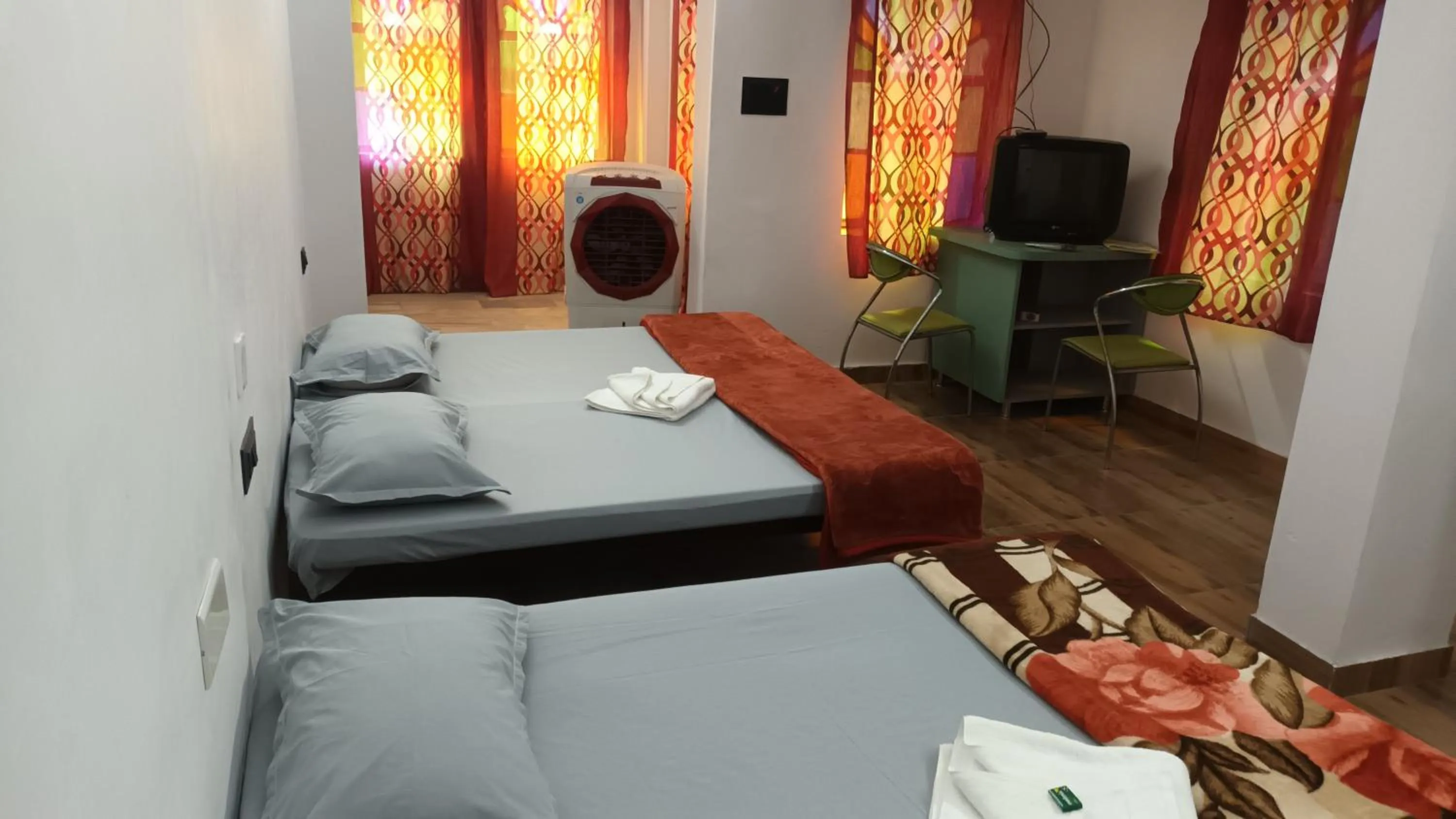 Living room, Bed in Jag Niwas Guest House & pure veg restaurant