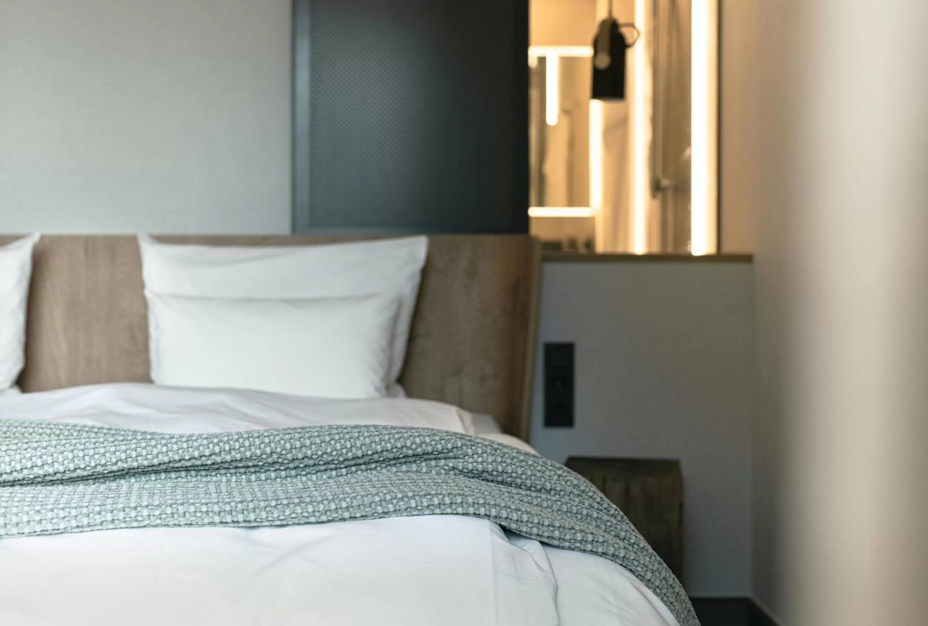 Bed in Hotel VierJahreszeiten am Seilersee