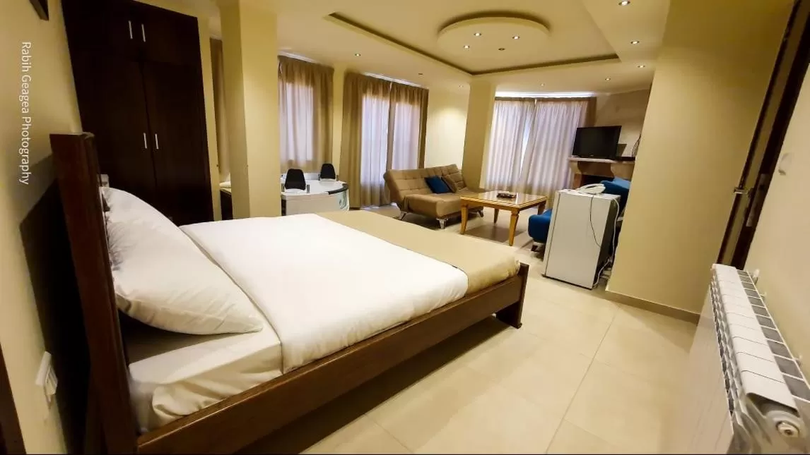 Bed in Hotel L'Aiglon