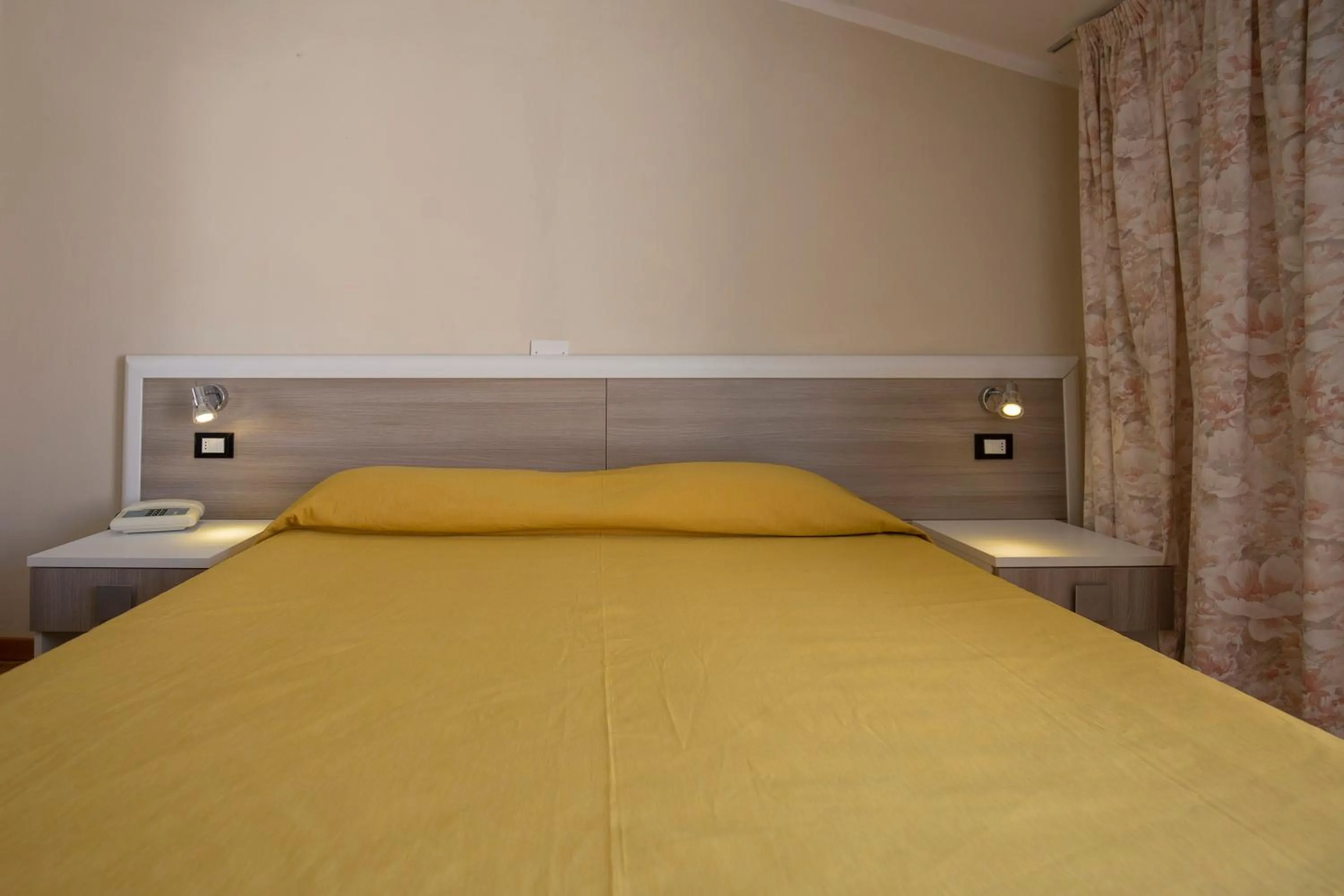 Bed in Hotel Fabricia