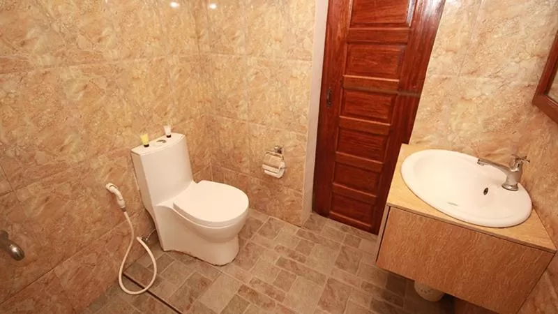 Toilet in El Nido Royal Palm Inn