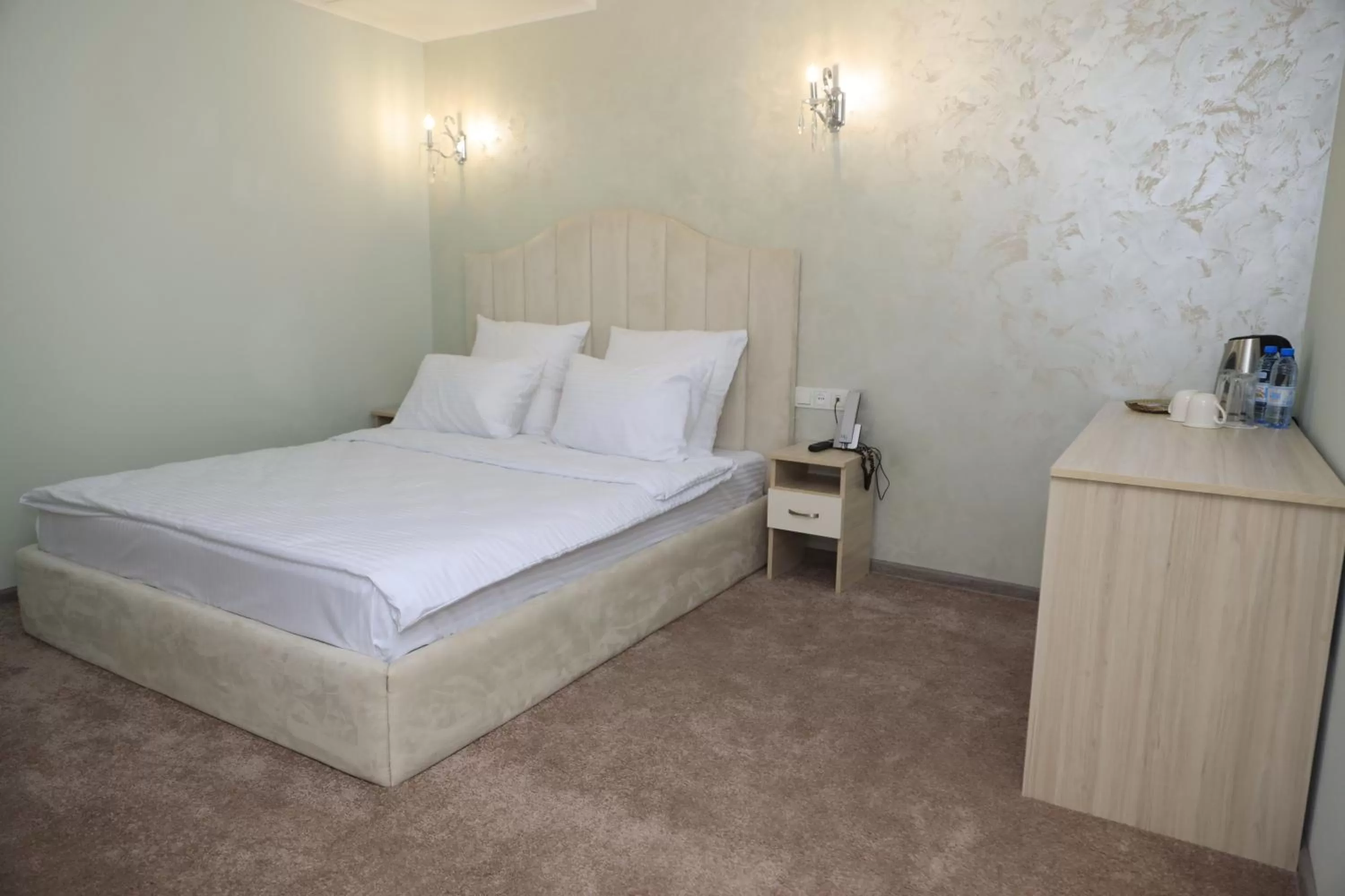 Bed in DeLin Hotel And Tours