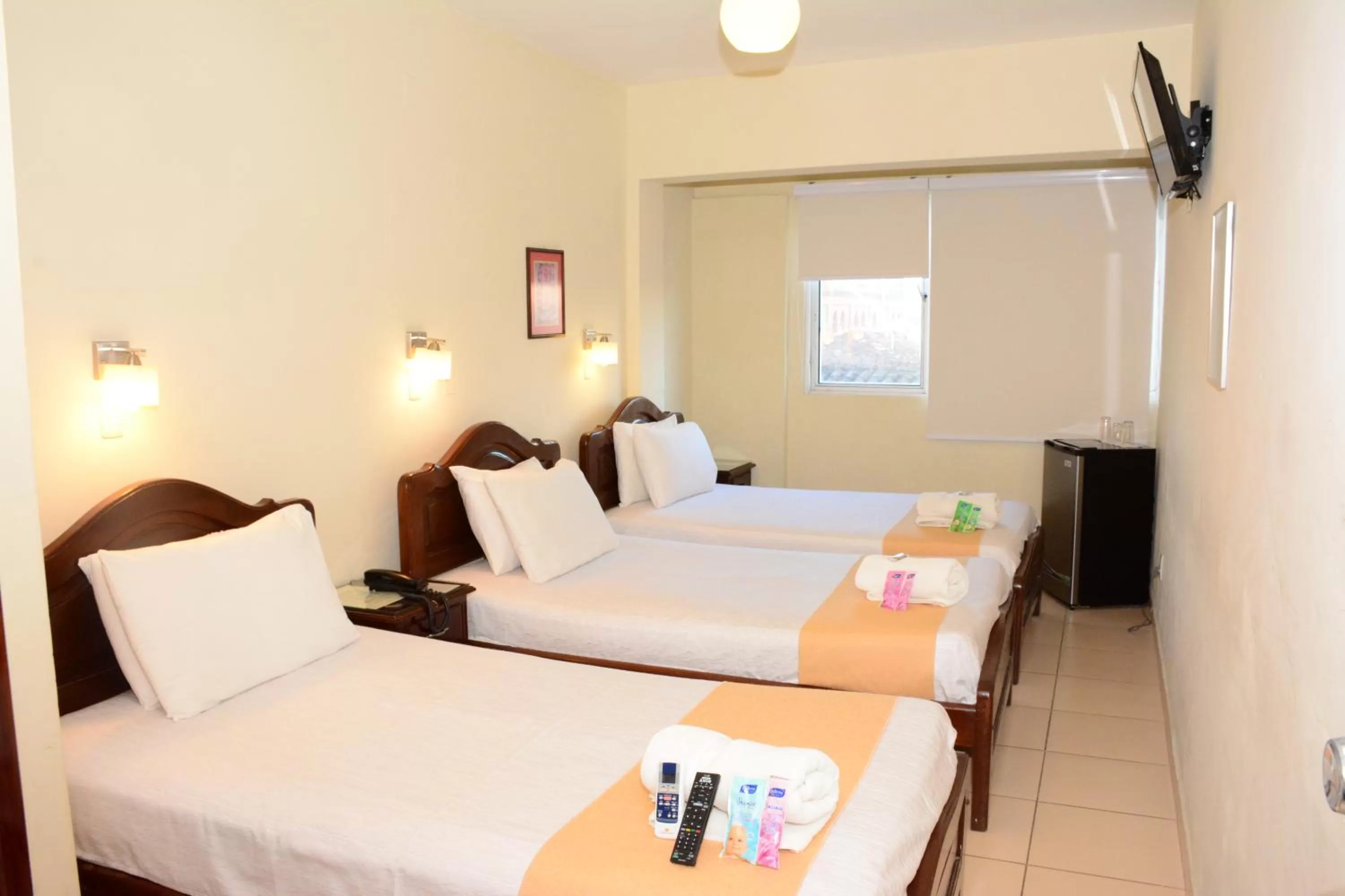 Bedroom, Bed in La Siesta Hotel