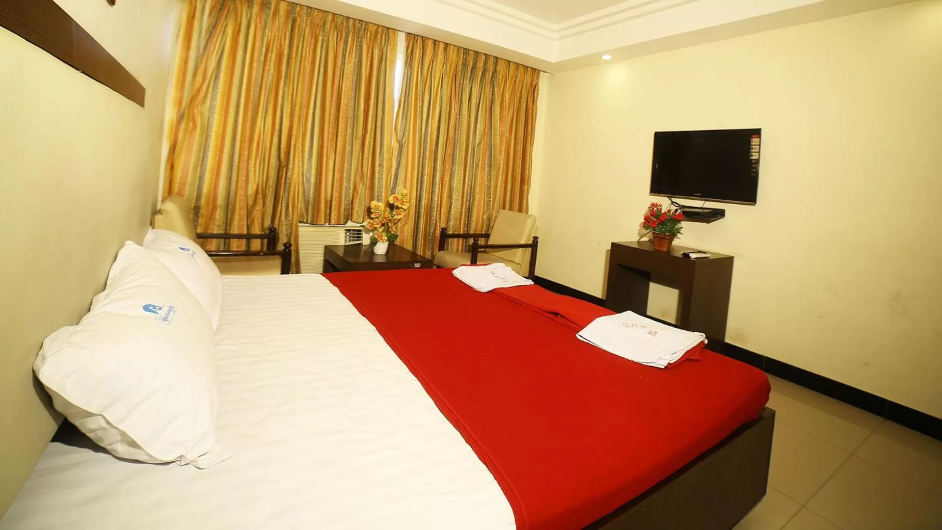 Bed in Hotel Rajavihar