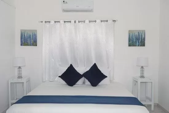 Bed in Beach Front TGR Hotels and Resorts