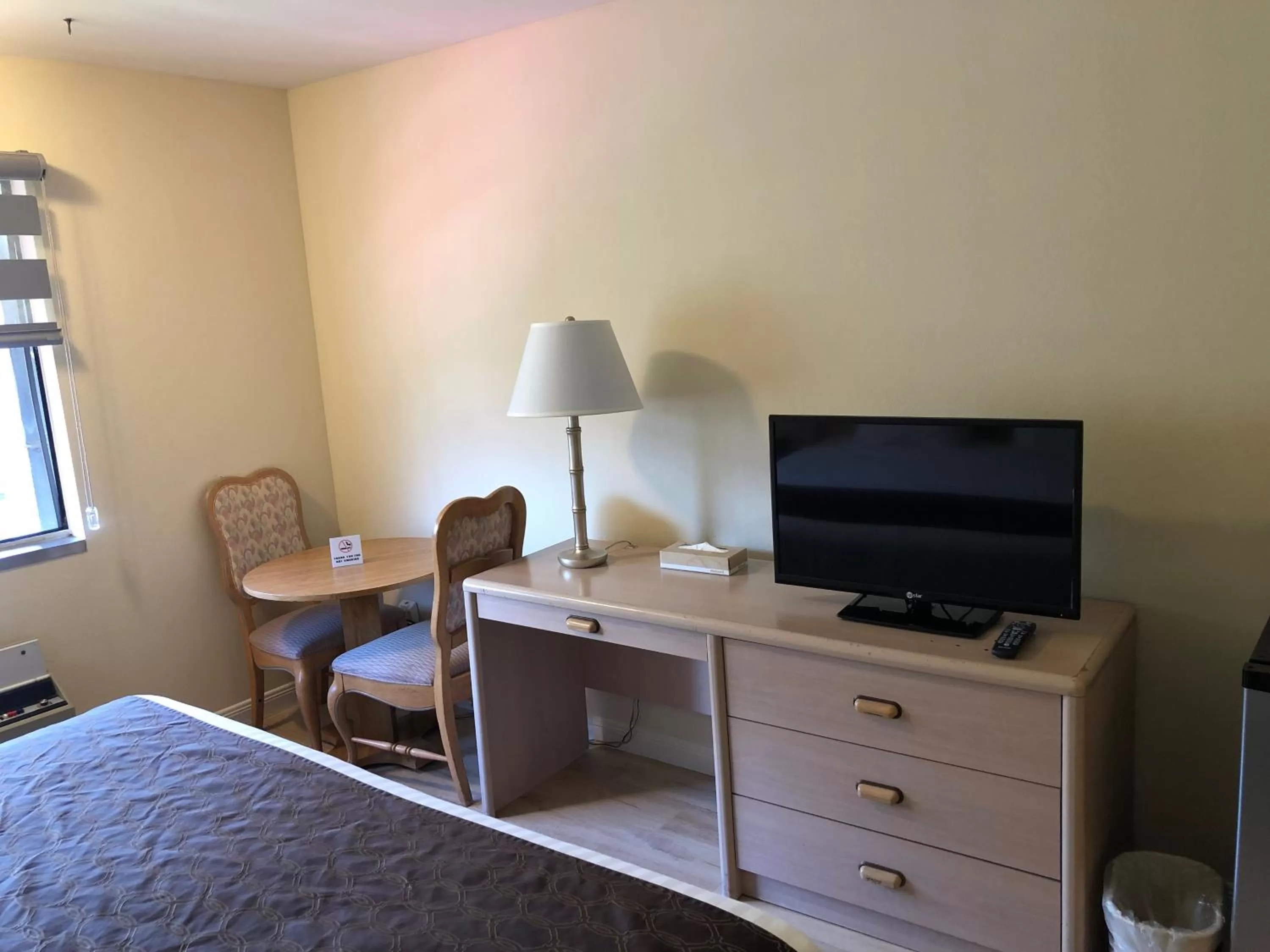 Bed in Rotex Western Inn