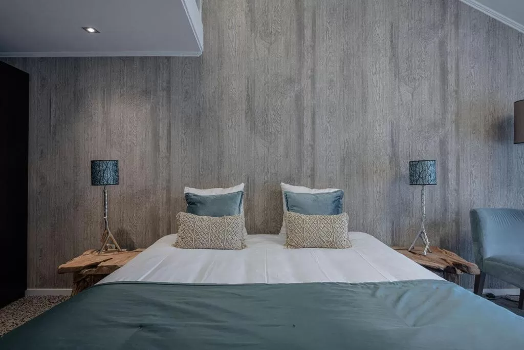 Bed in Boutique Hotel Slenaker Vallei - Buitengewoongenieten