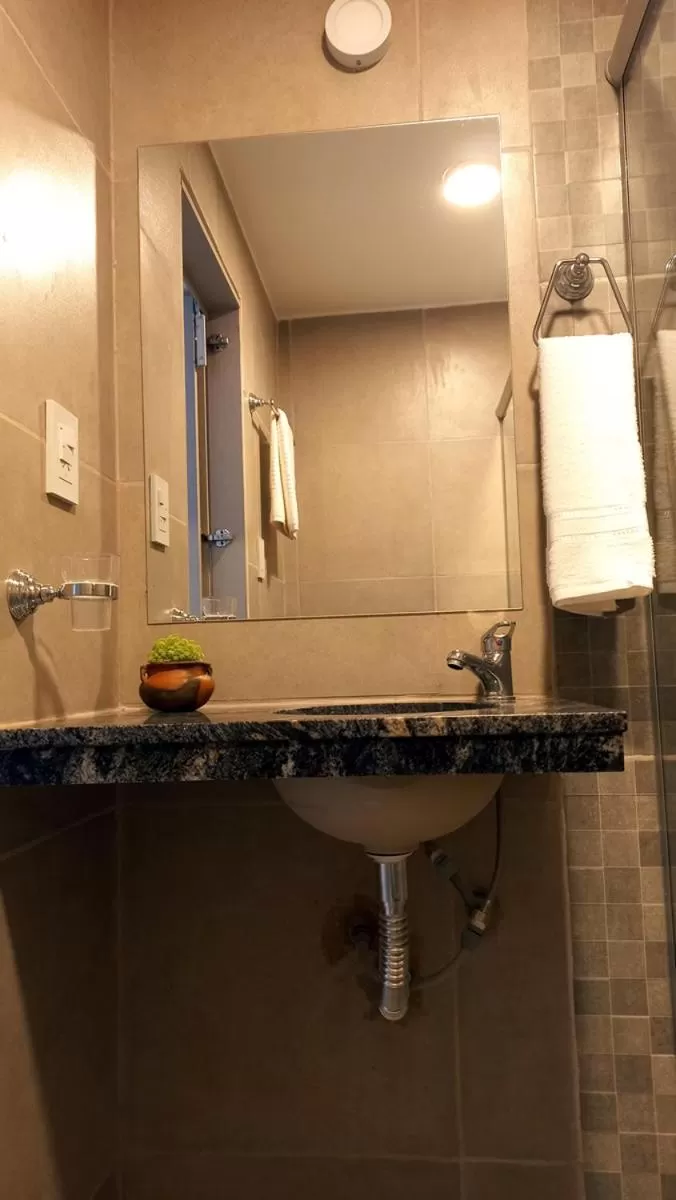 Bathroom in Hotel Musto