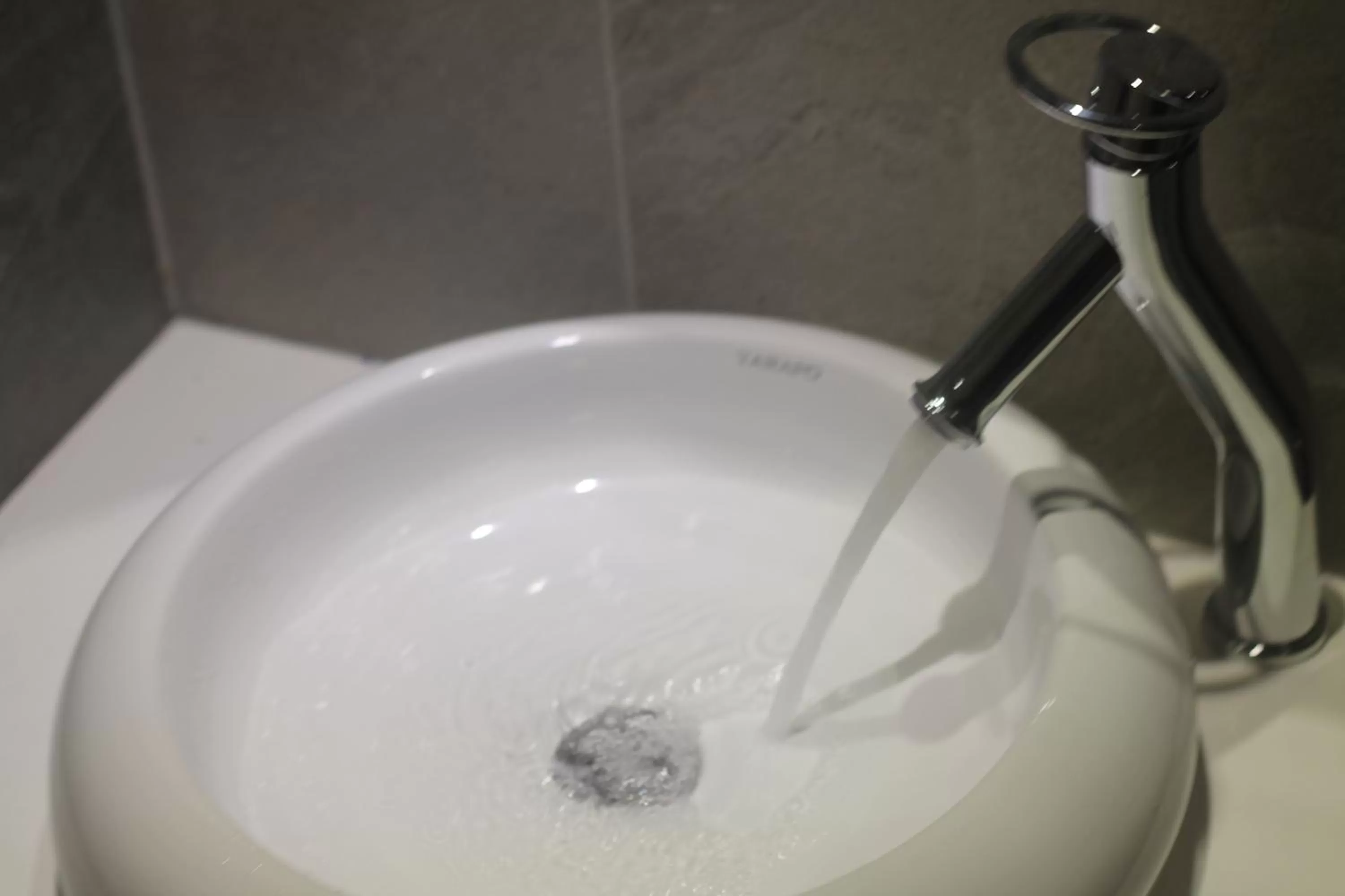 Bathroom in Benny's City Hotel