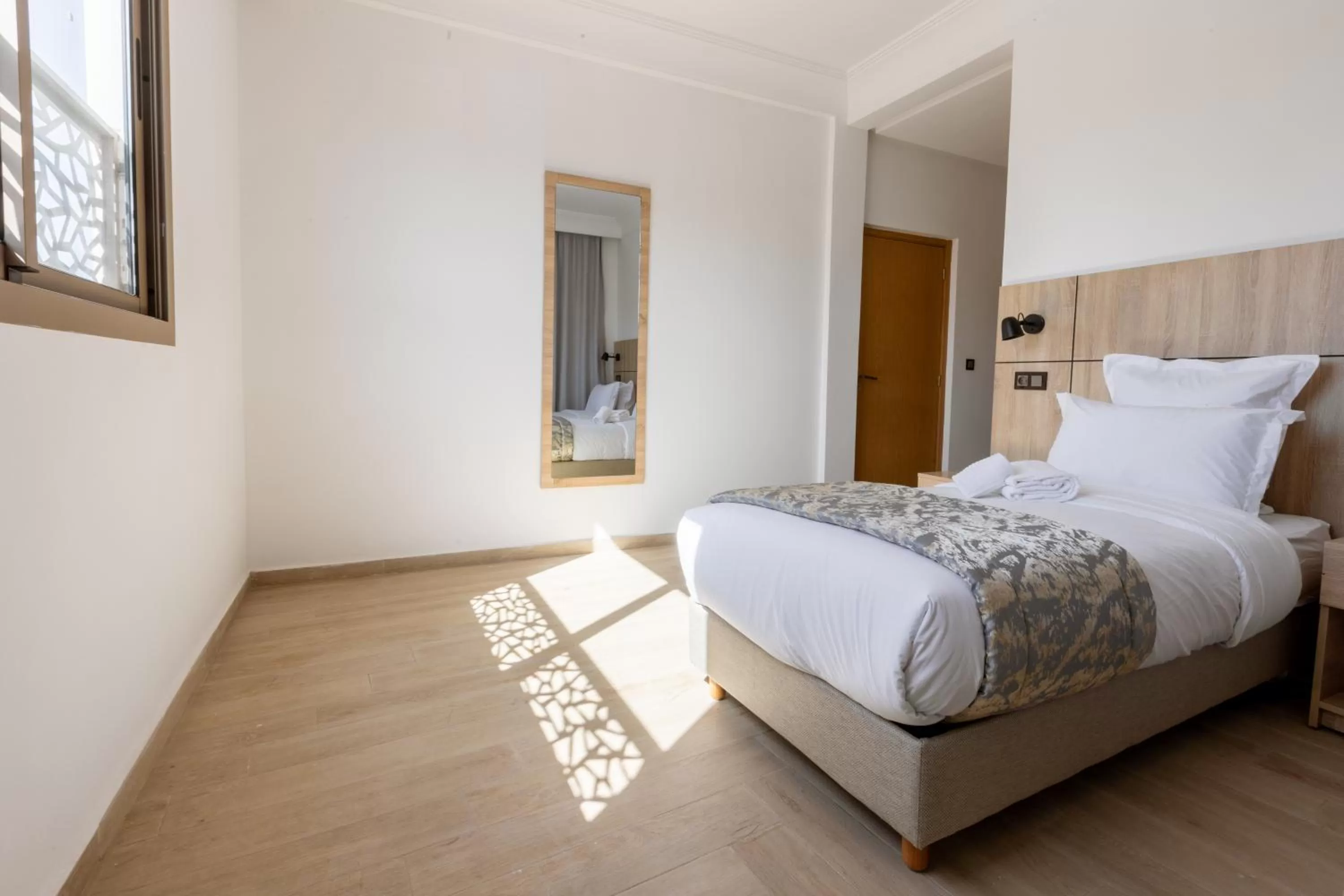 Bed in Karam City Hotel