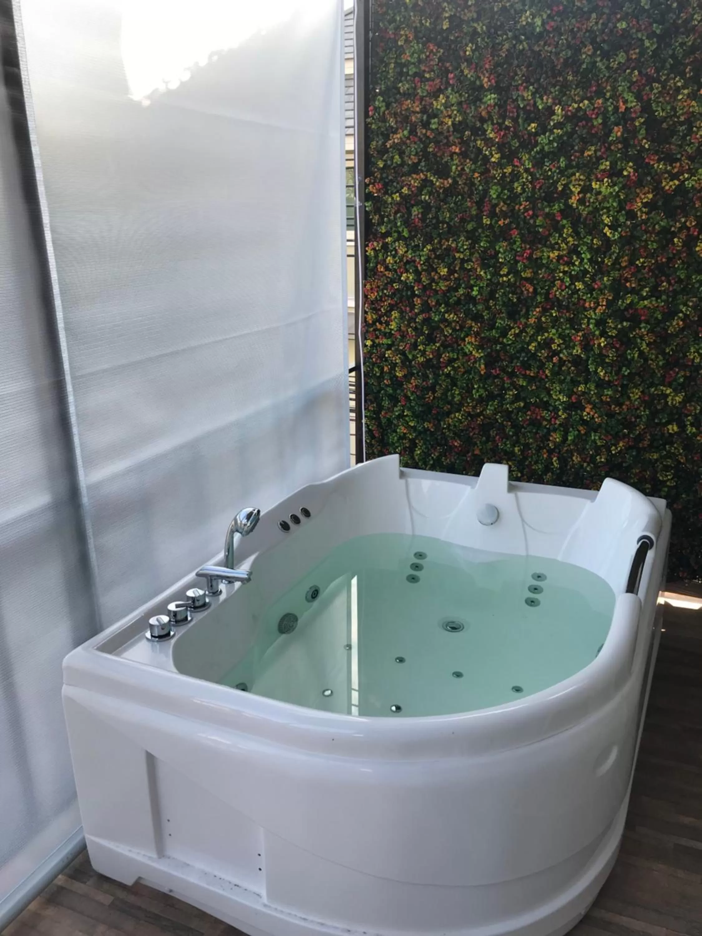 Bath in V20 Boutique Jacuzzi Hotel