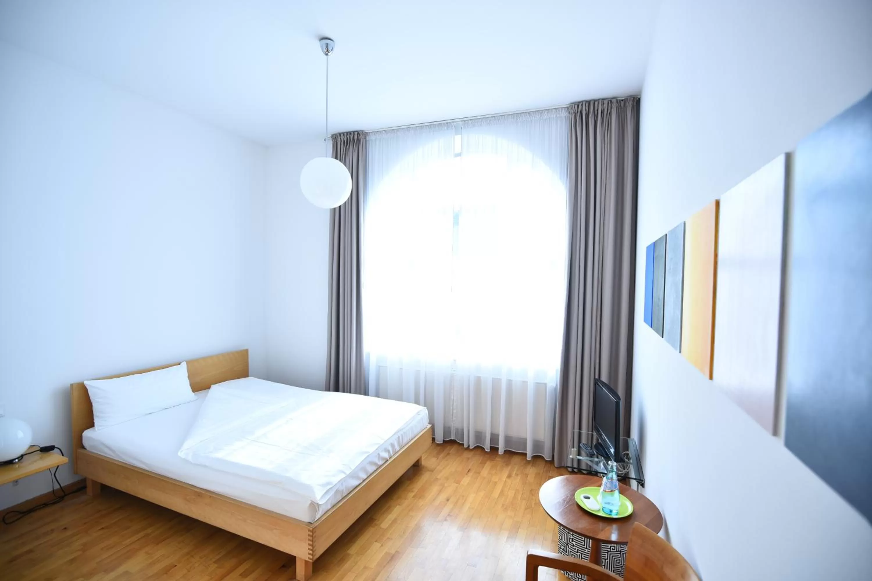 Bed in Art-Hotel Robert Mayer