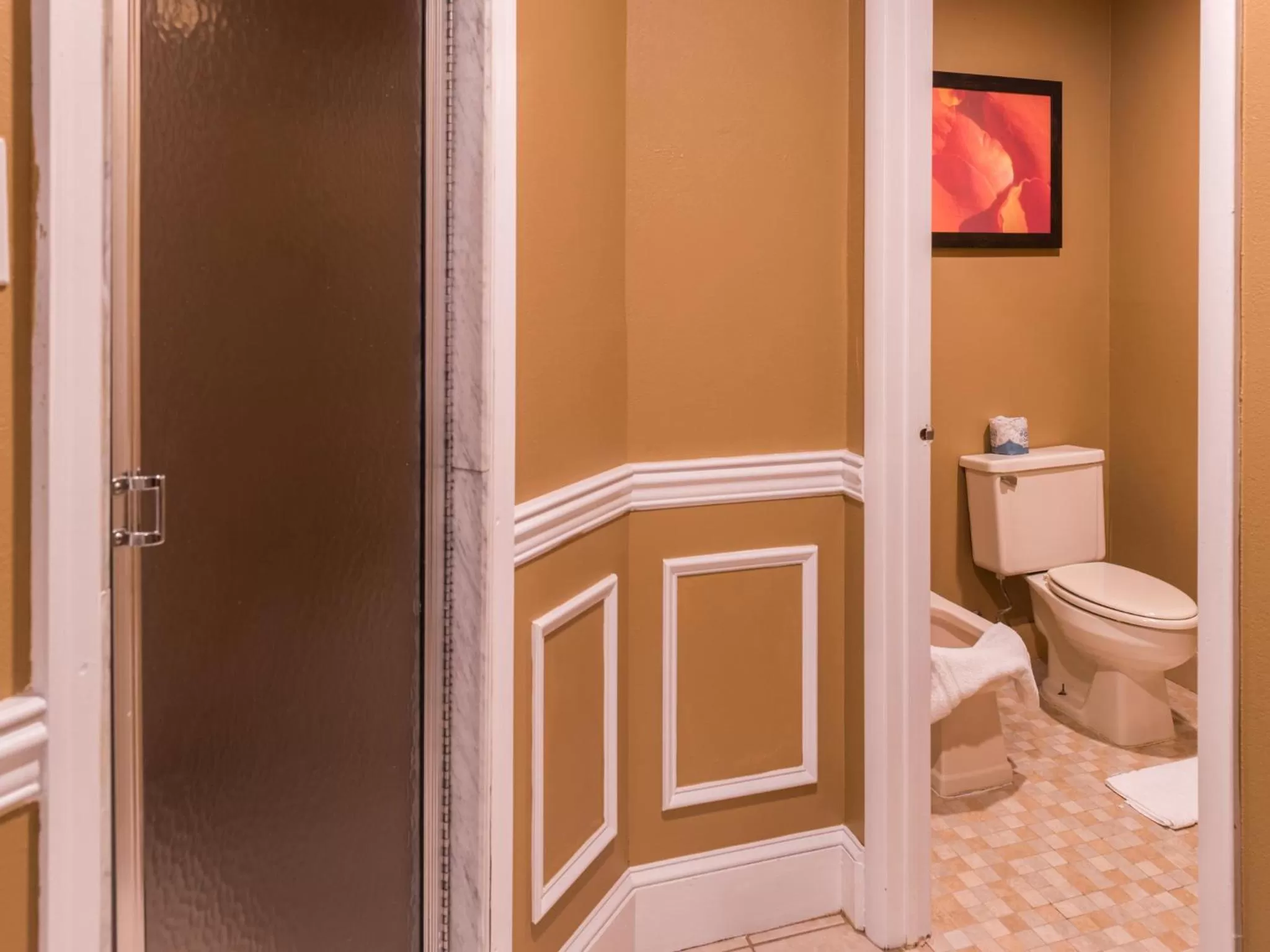 Toilet in Inn of The Dove Romantic Luxury & Business Suites