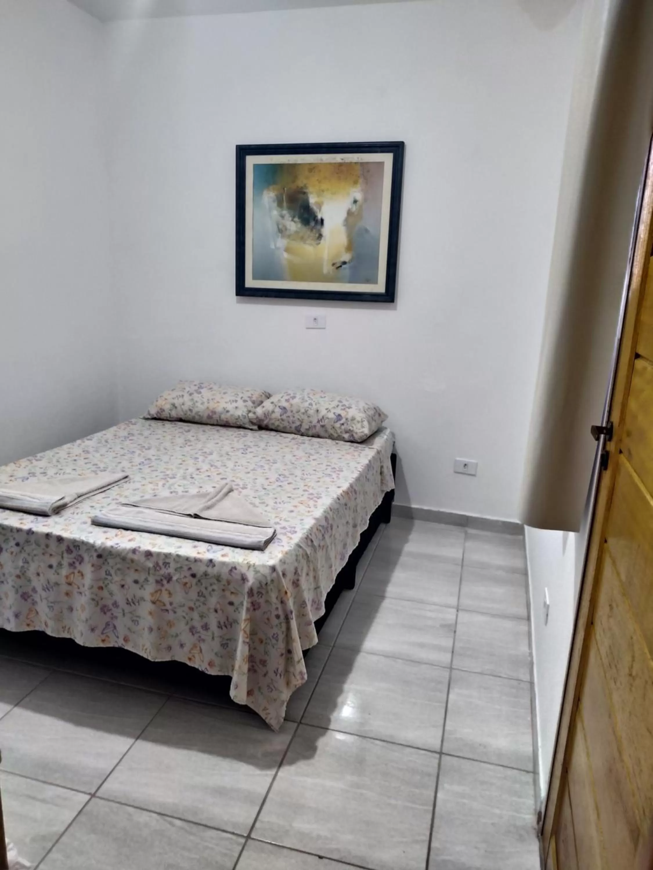 Bed in Pousada Na Praia Ubatuba