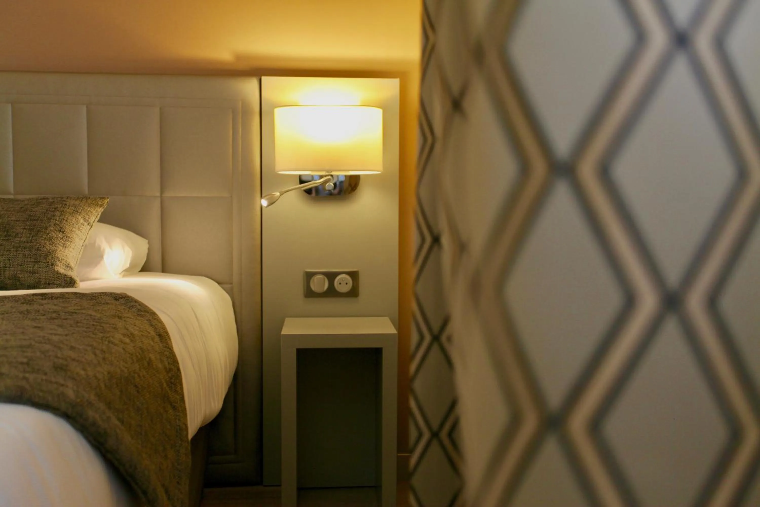 Bed in Logis Hôtel Restaurant Le Moulin de la Coudre