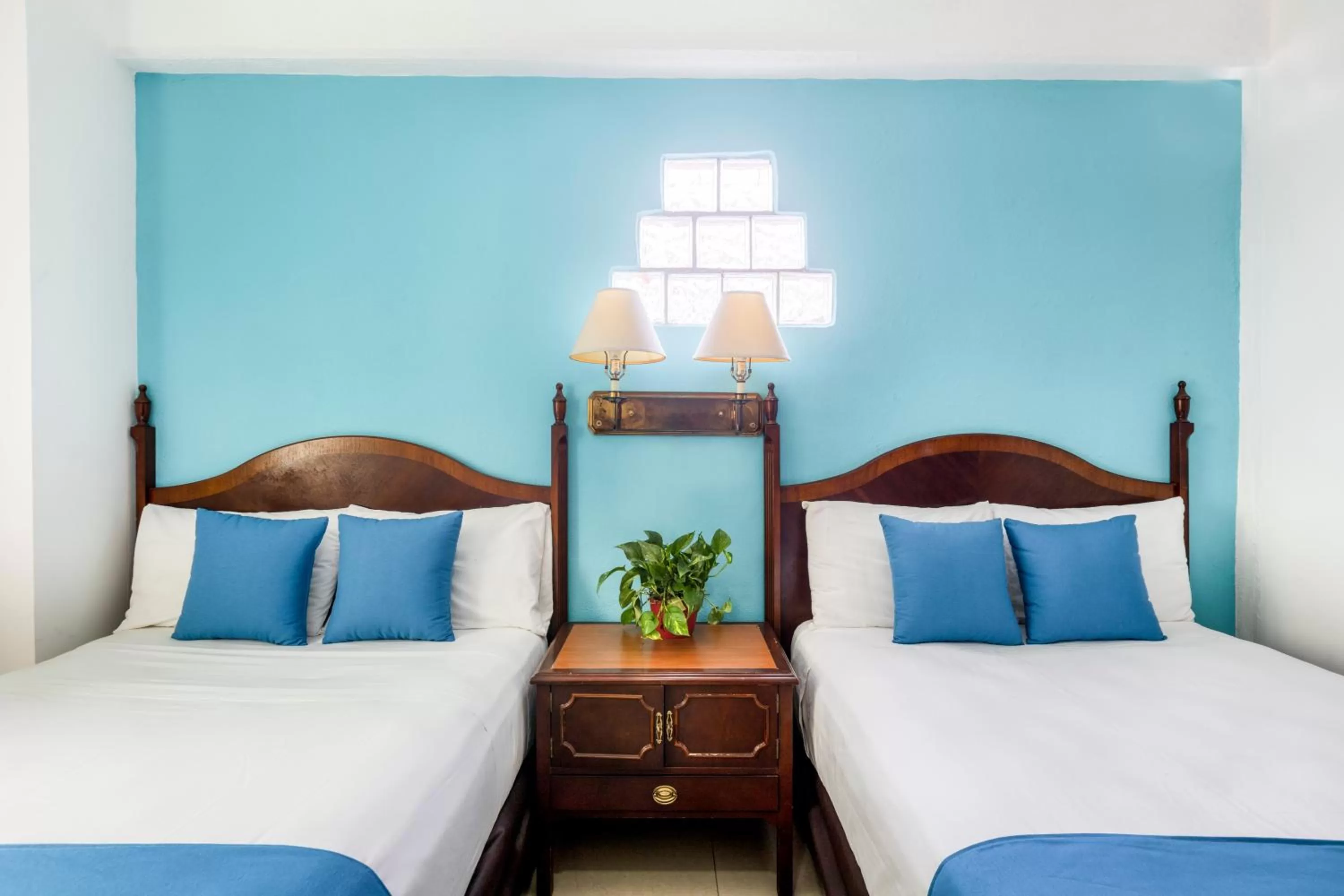 Bed in Hotel Pueblito Vallarta