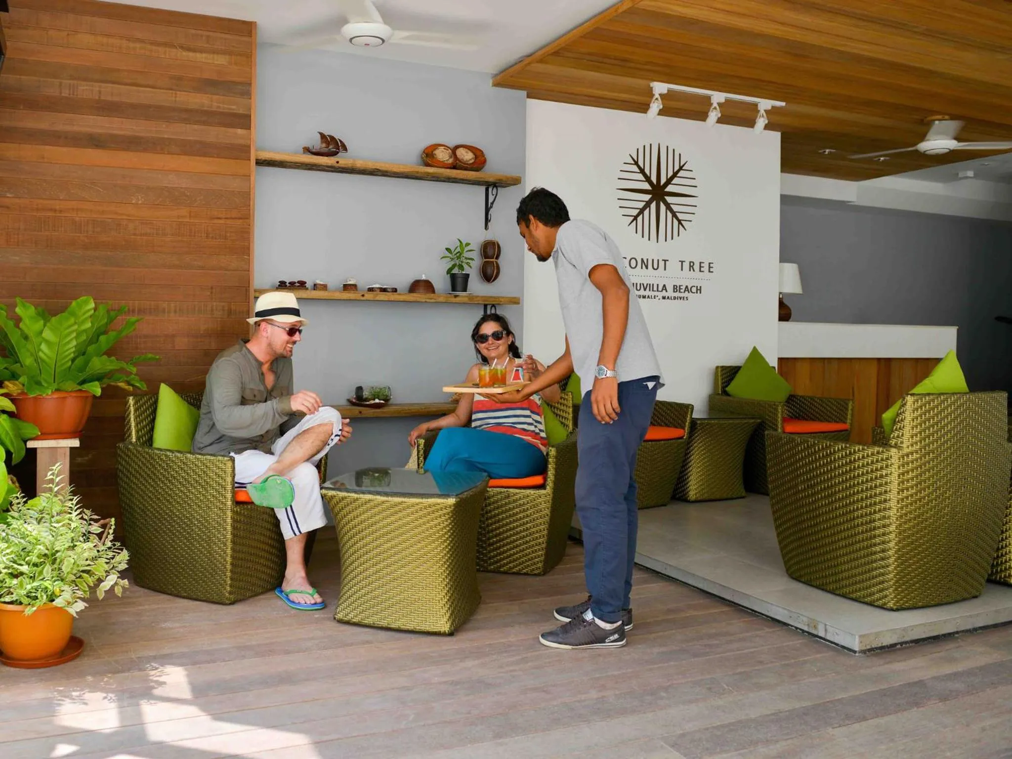 Staff in Coconut Tree Hulhuvilla Beach