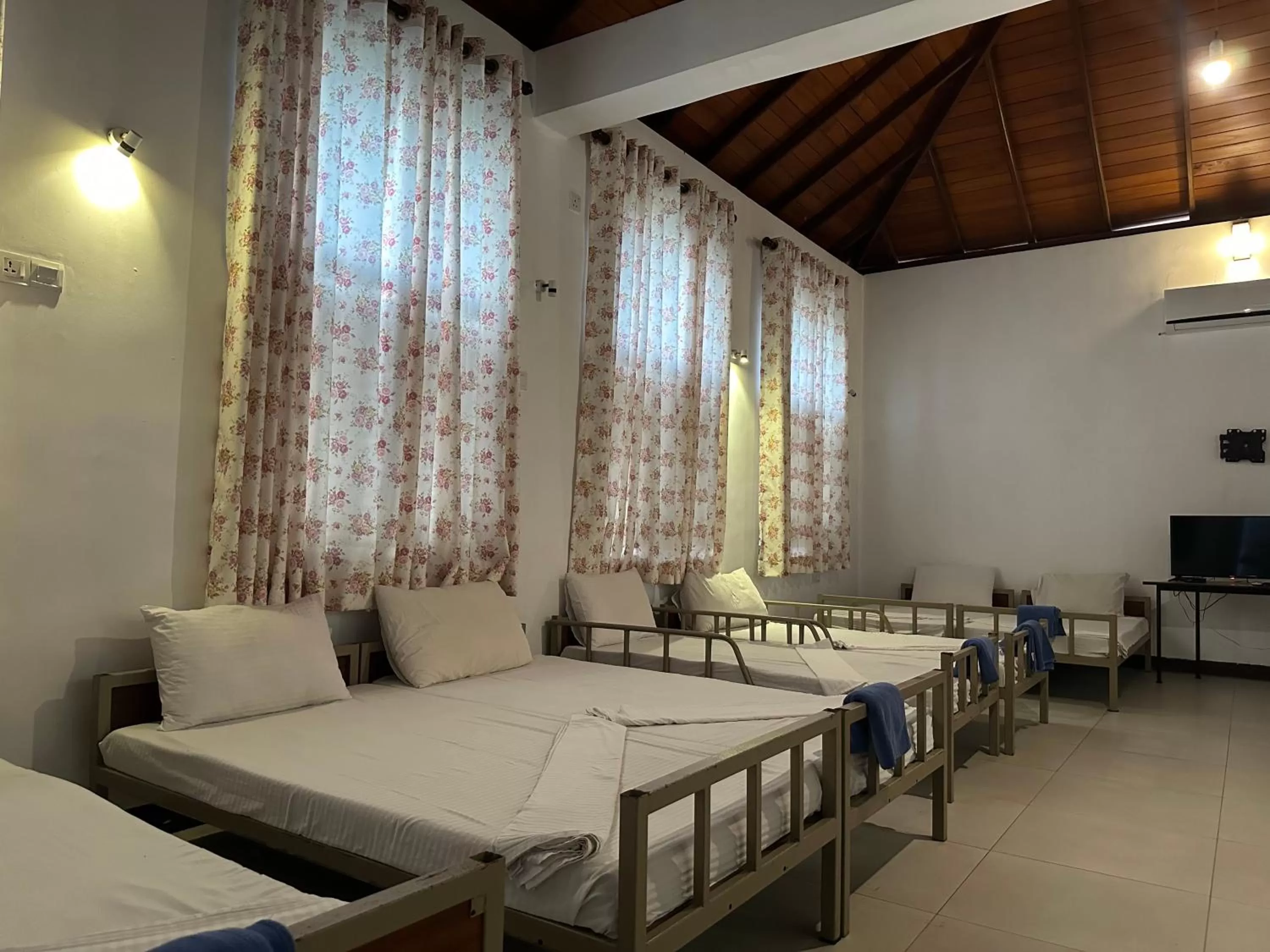 Photo of the whole room, Bed in Amaluna Resorts