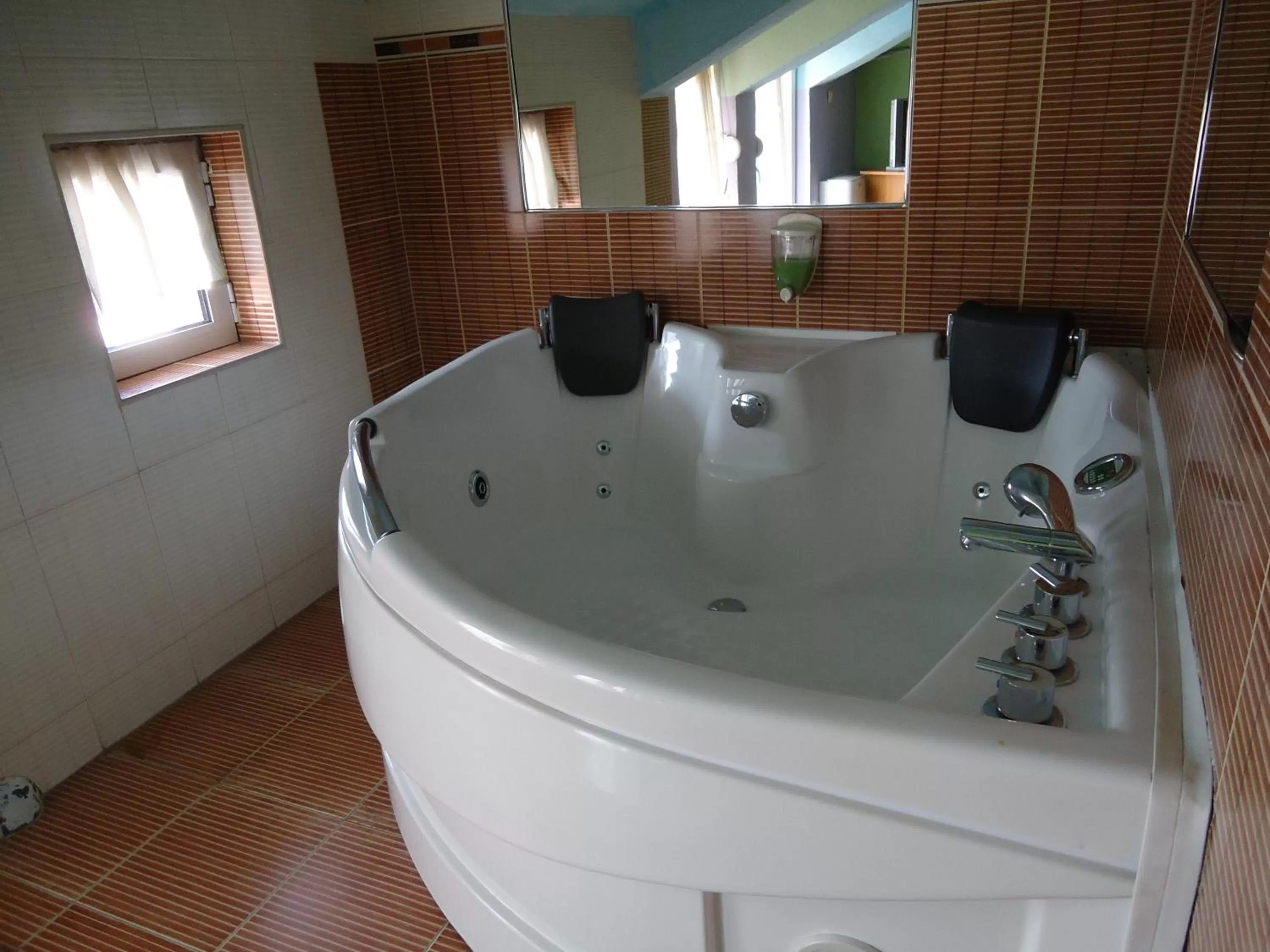 Bathroom in Dionis Hotel