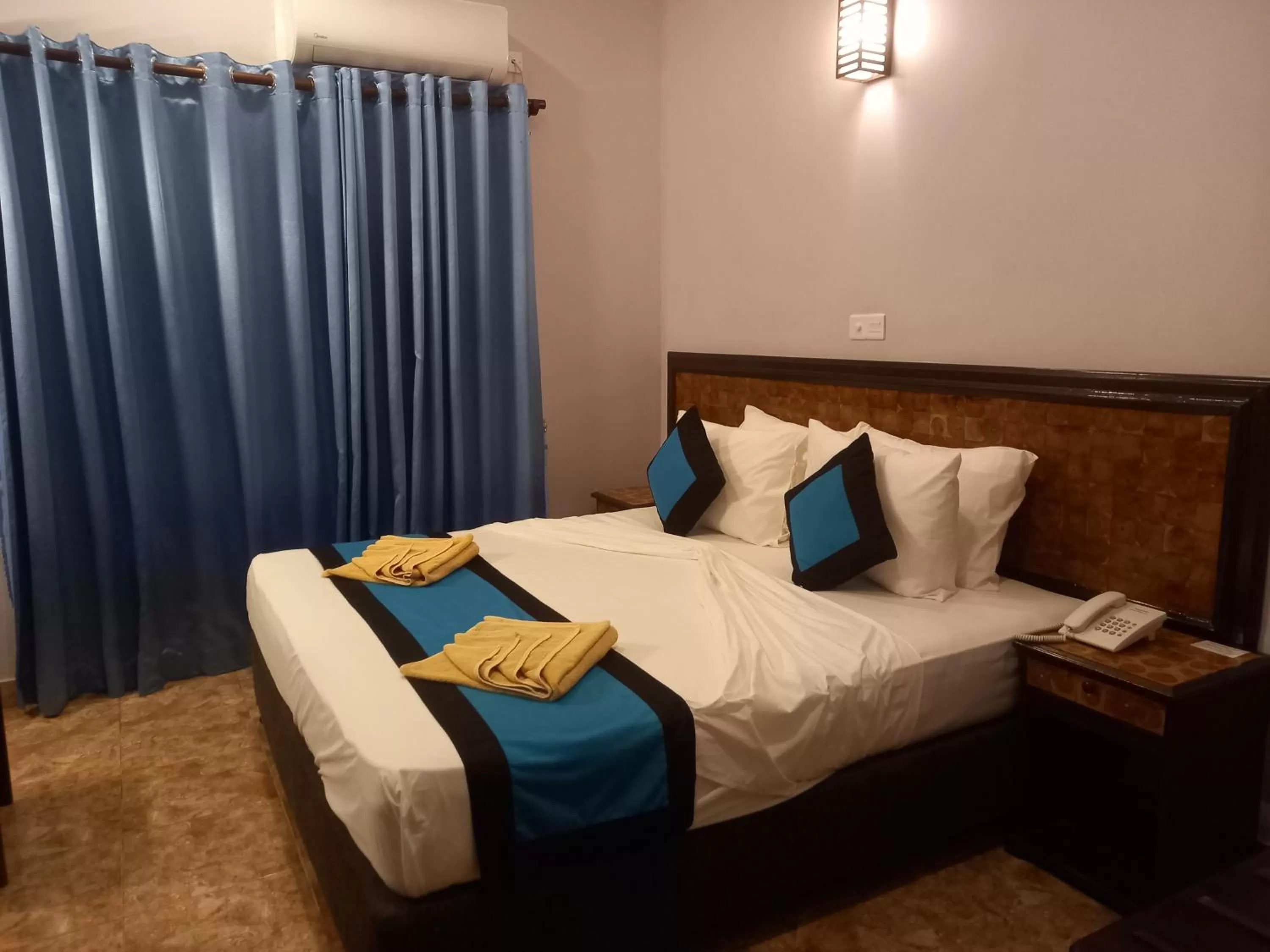 Bed in Blue Sand Beach Resort