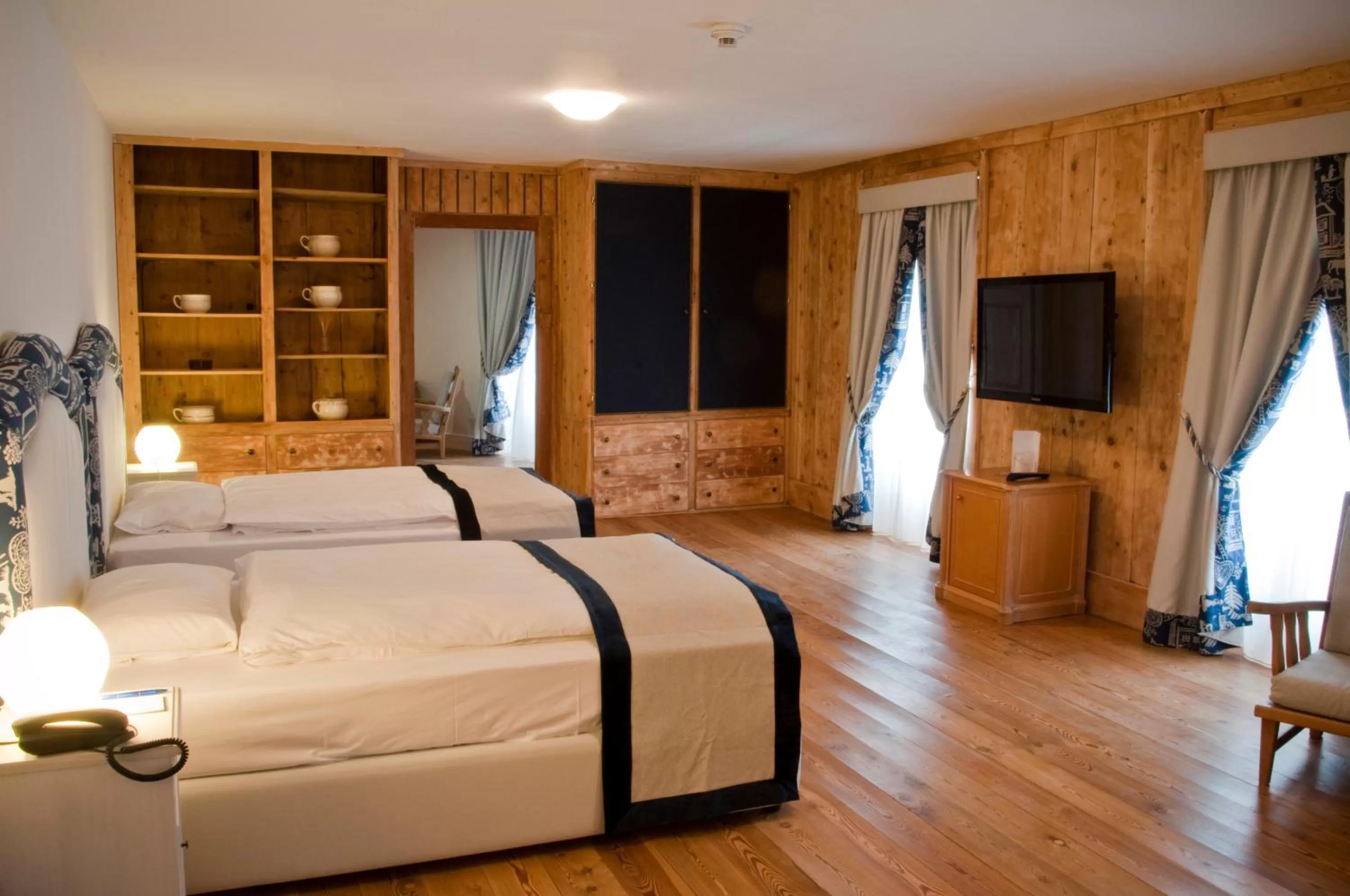 Bed in Hotel Bernina 1865 by Kleos Group Collection