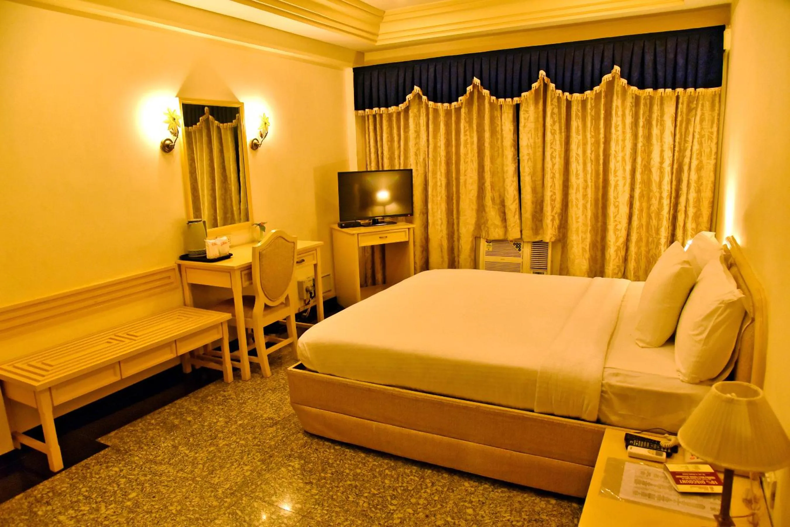 Bedroom, Bed in Hotel Poonja International