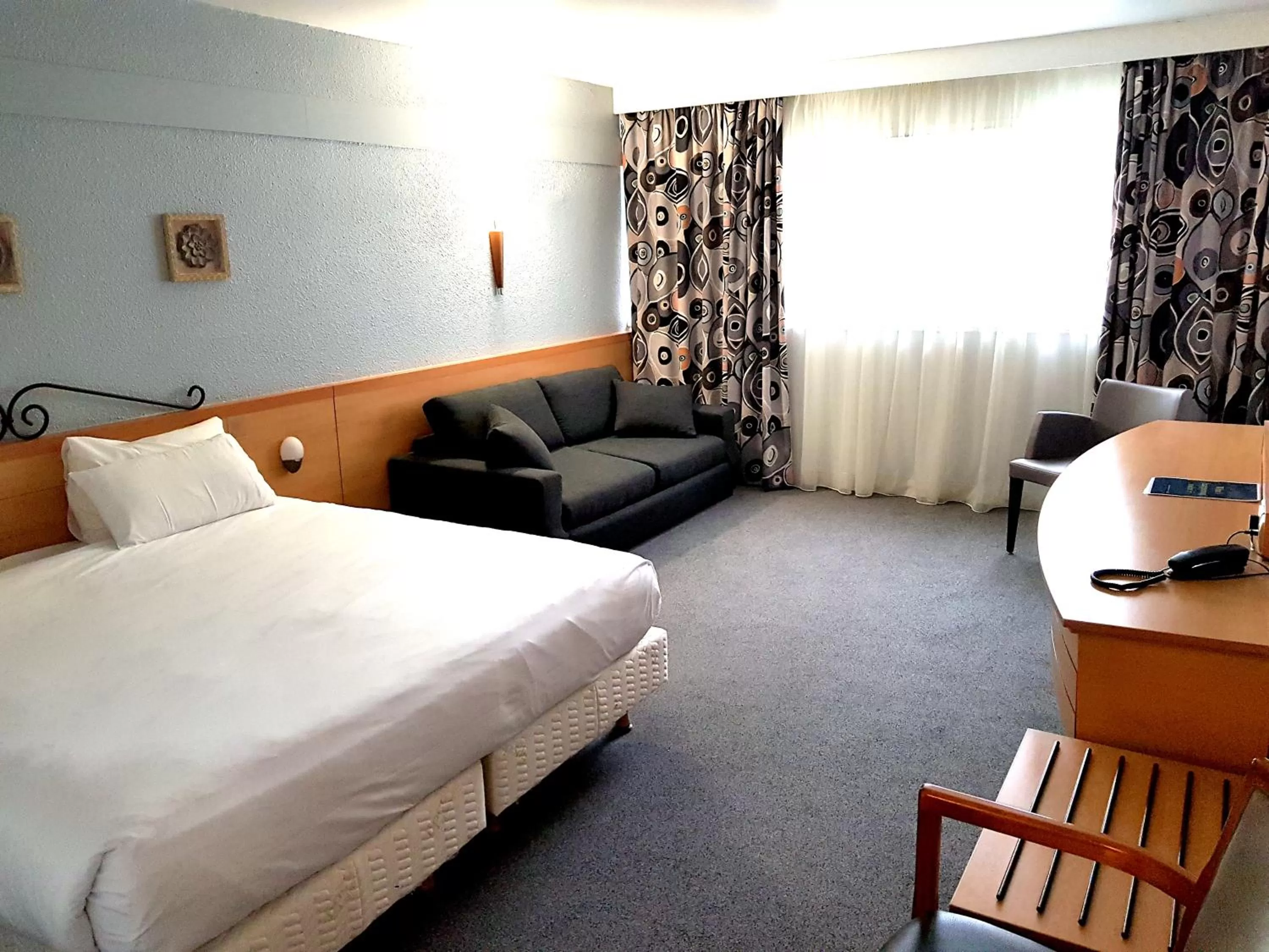 Photo of the whole room, Bed in Kyriad Prestige Mulhouse - Basel